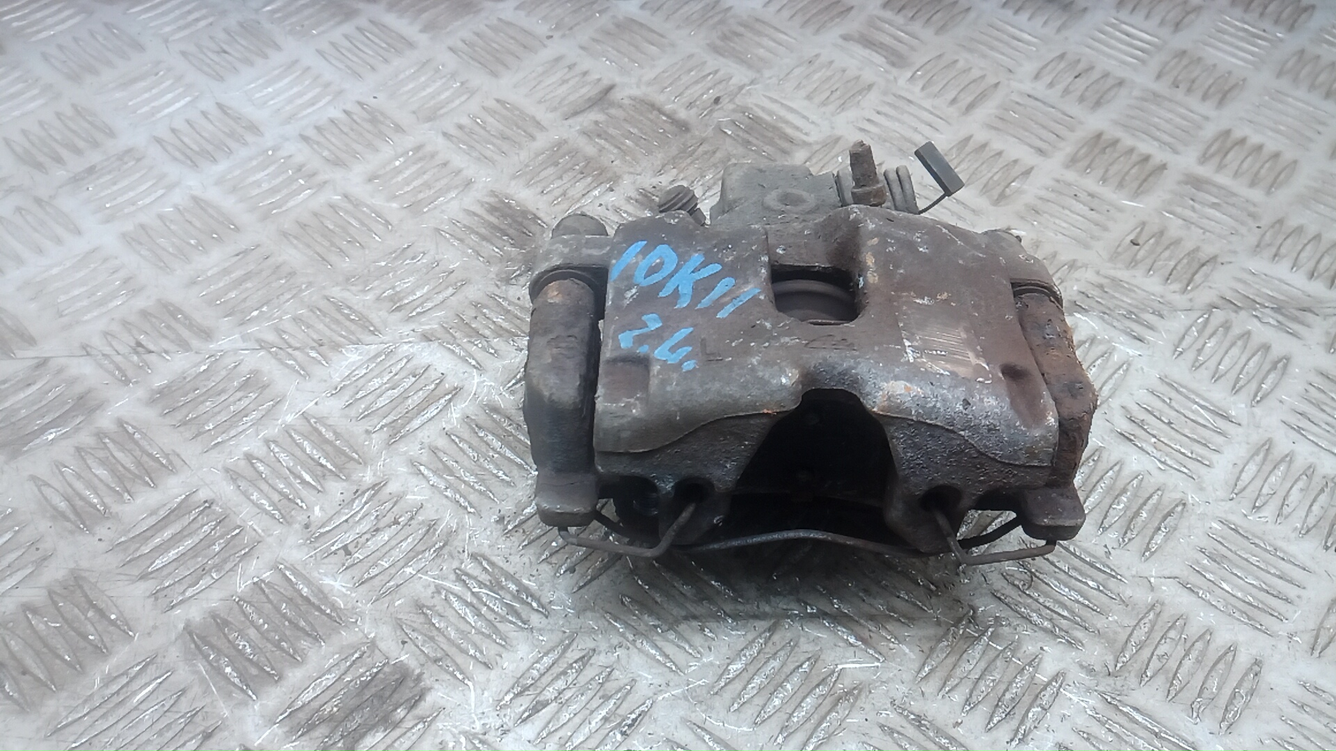 Суппорт задний левый