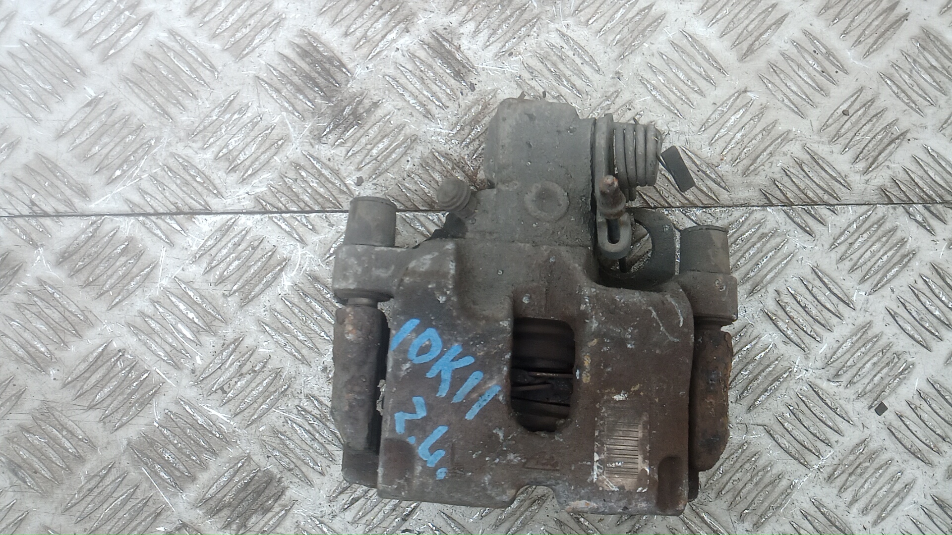 Суппорт задний левый