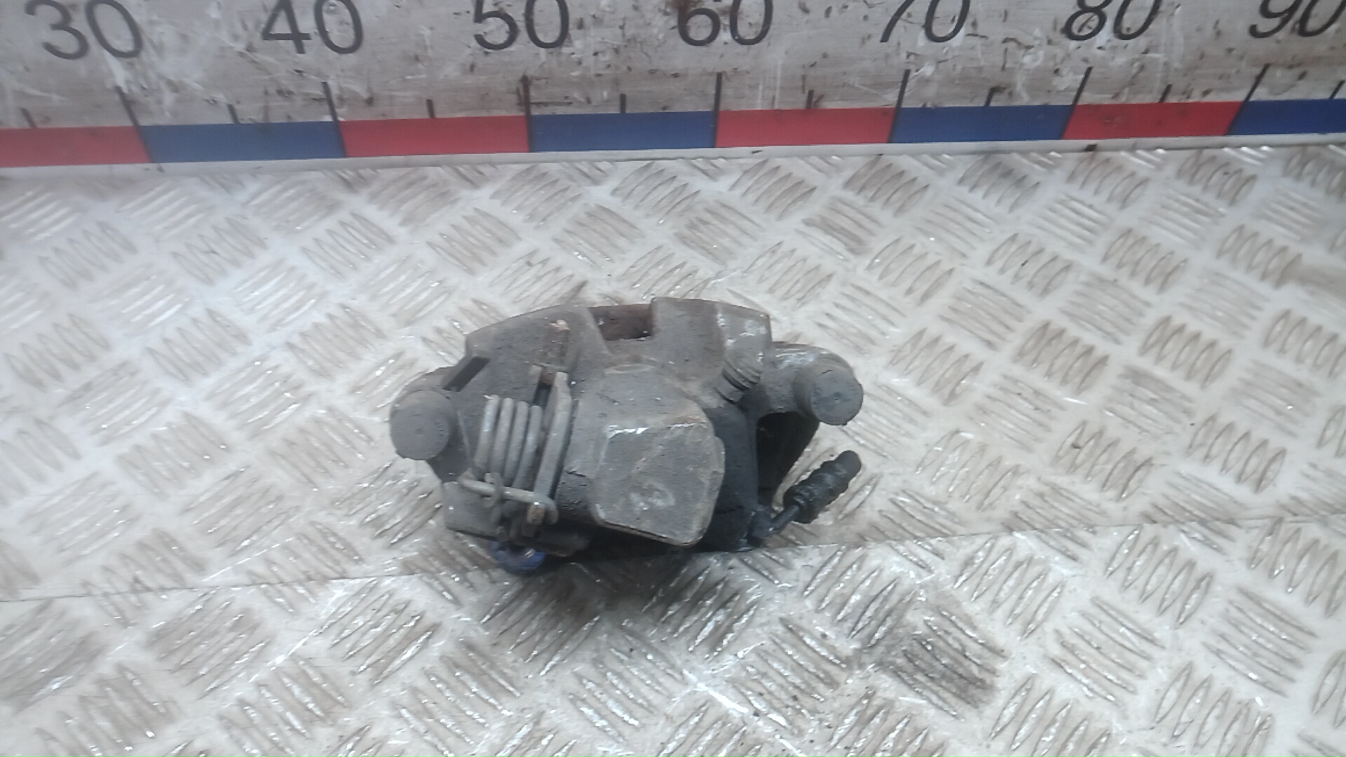 Суппорт задний левый