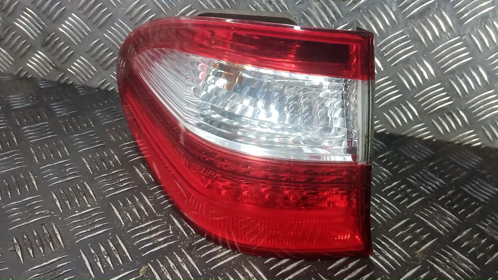 Фонарь задний левый