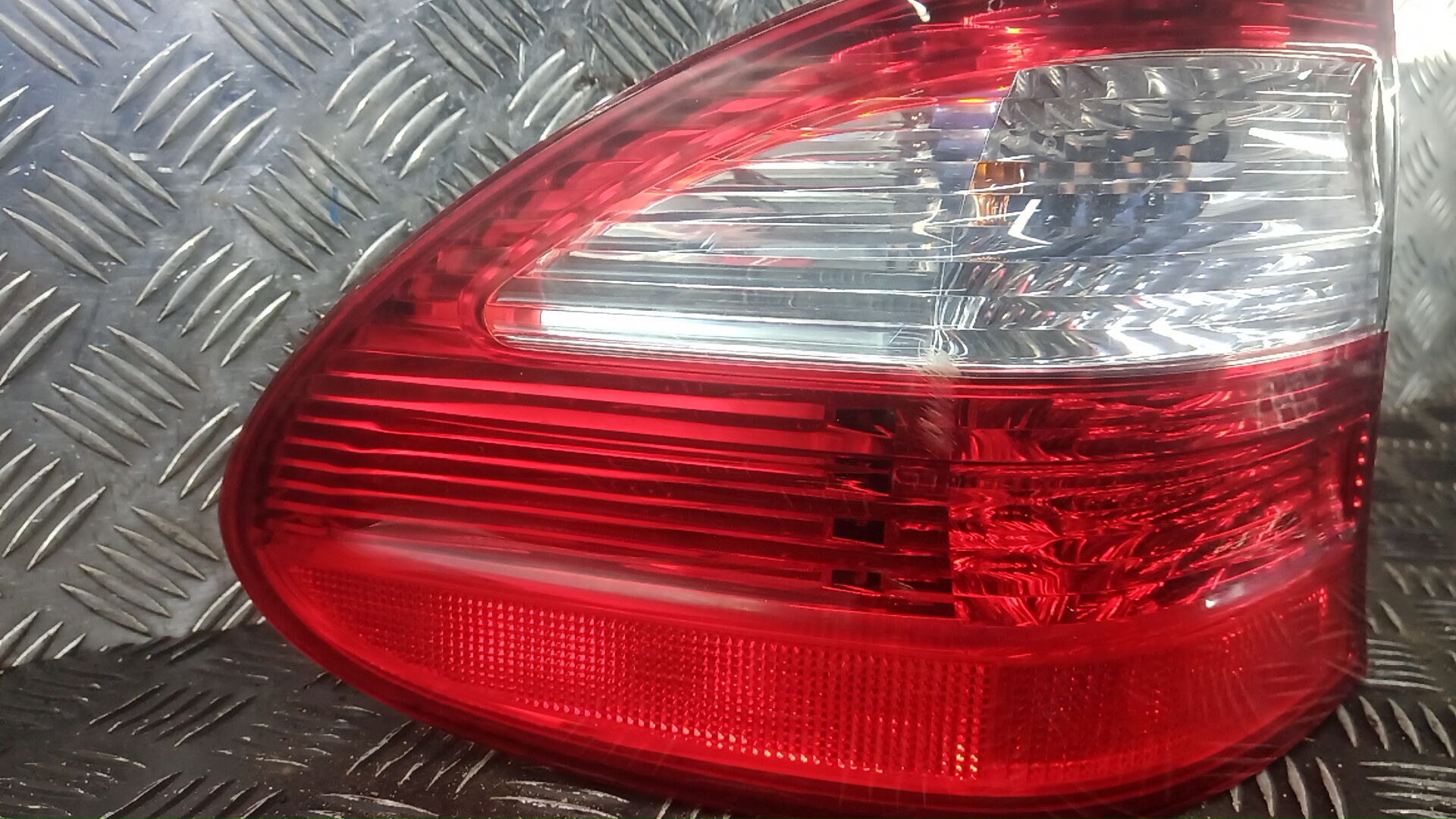 Фонарь задний левый