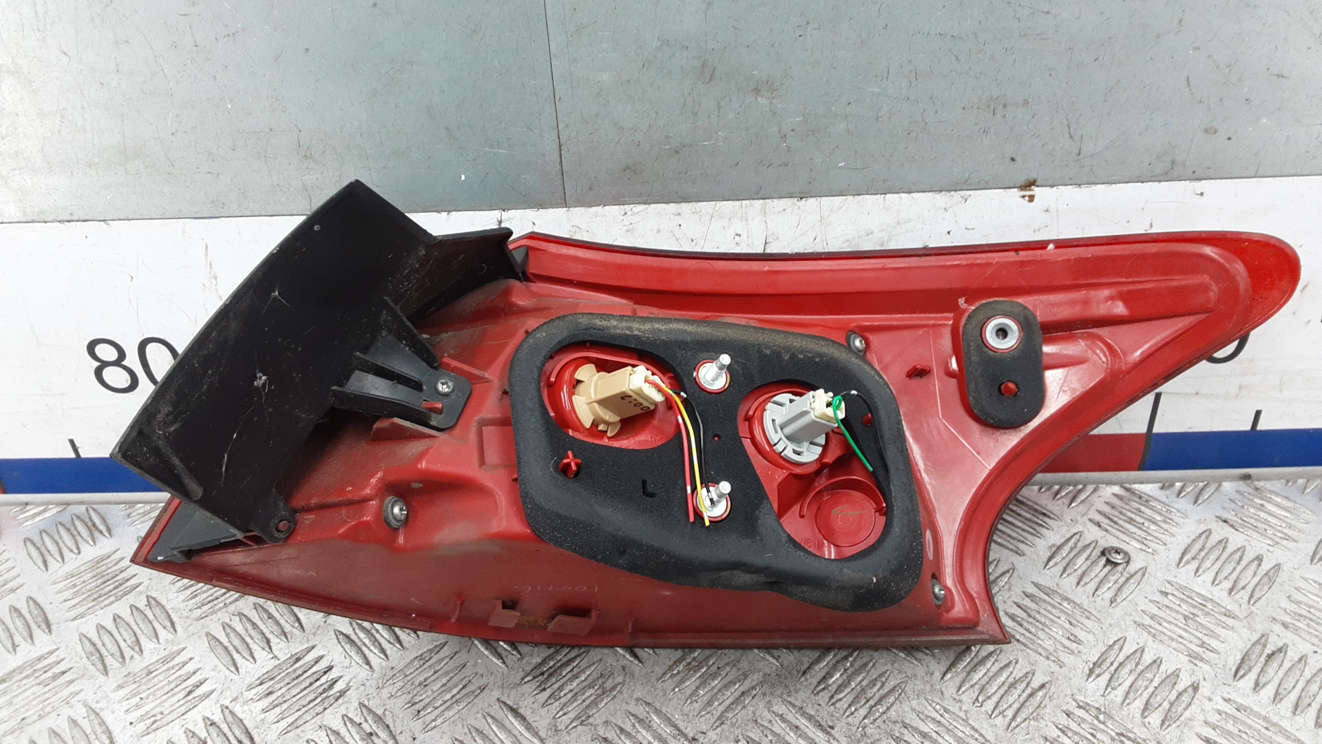 Фонарь задний левый