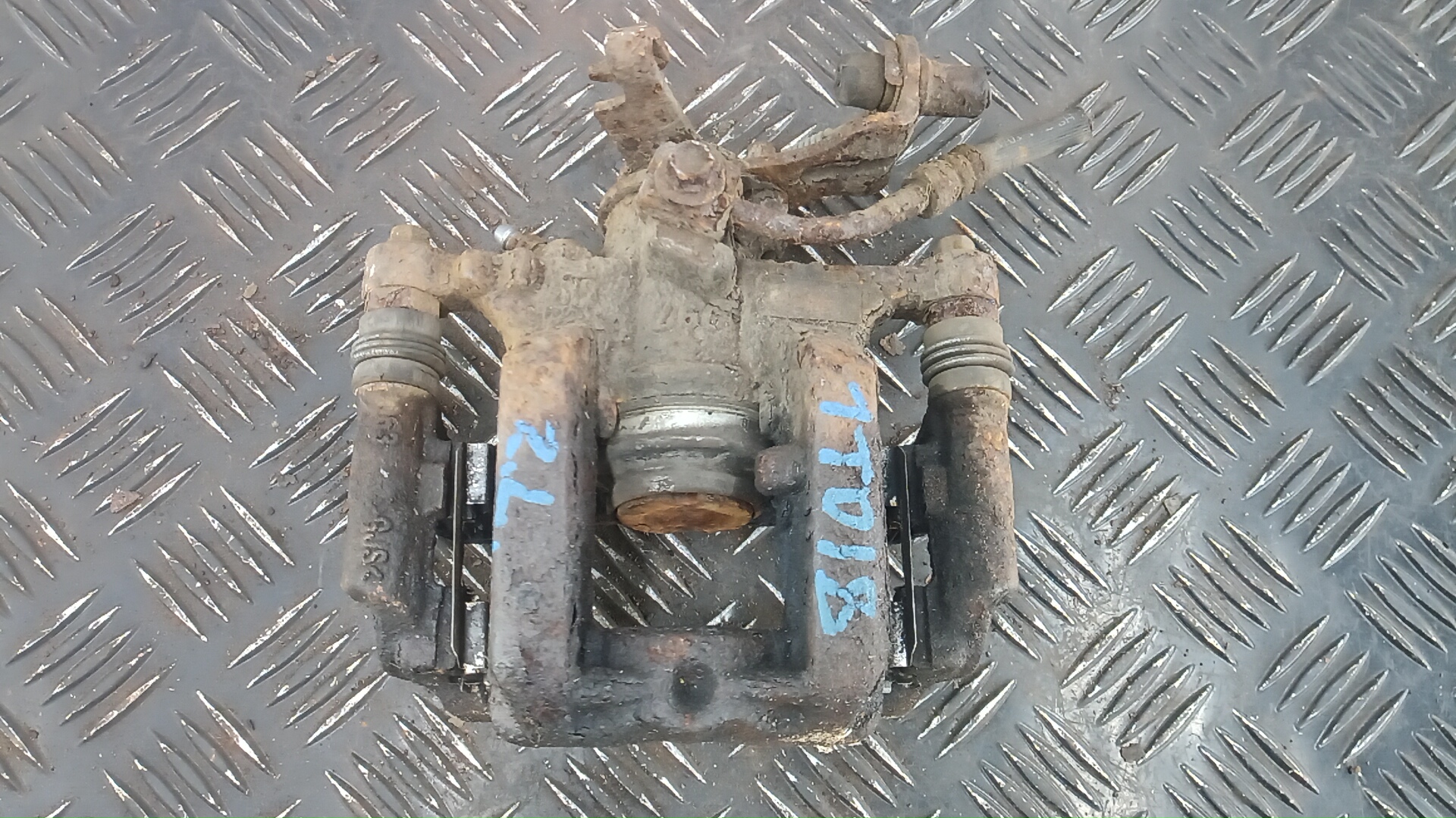 Суппорт задний левый