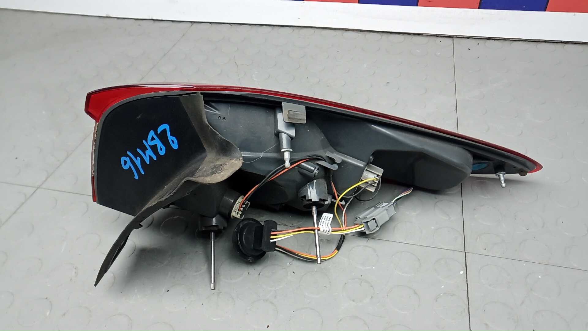 Фонарь задний левый