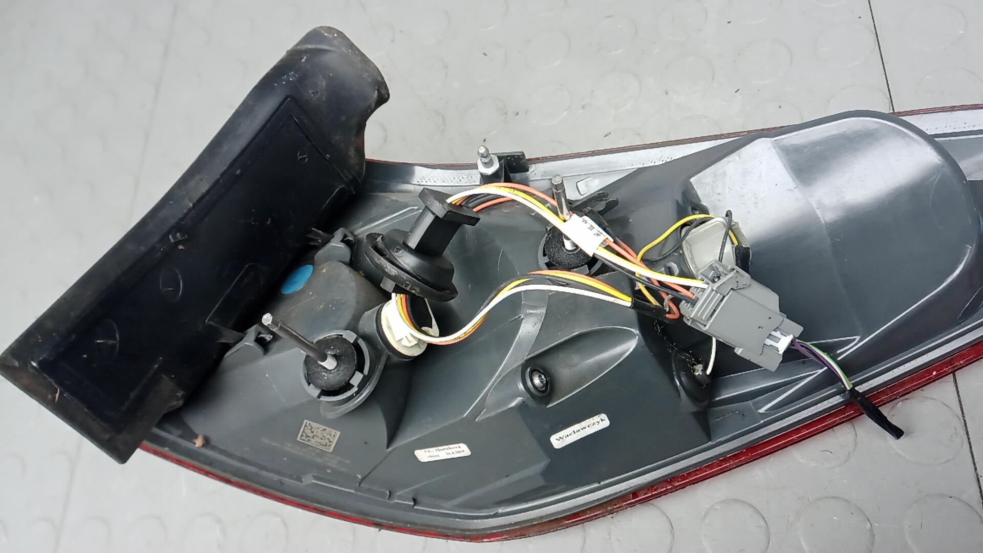 Фонарь задний левый