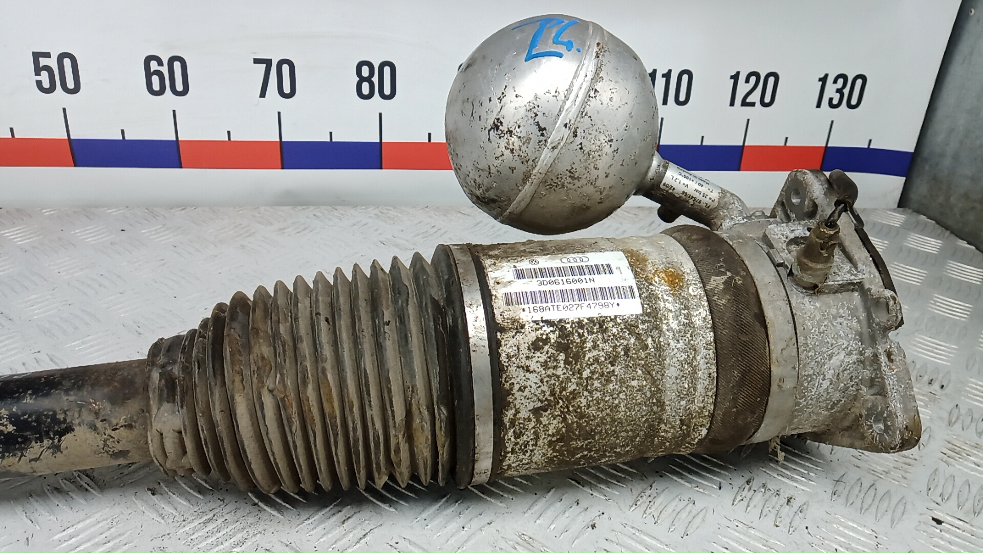 Амортизатор задний левый