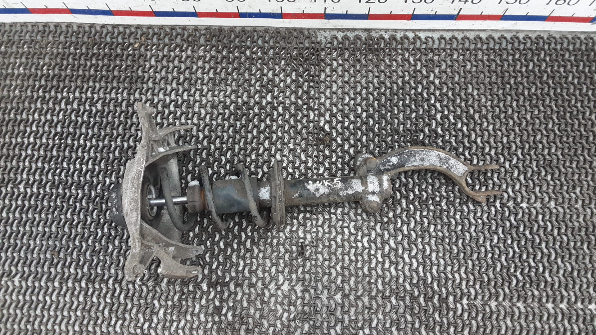 Амортизатор передний левый