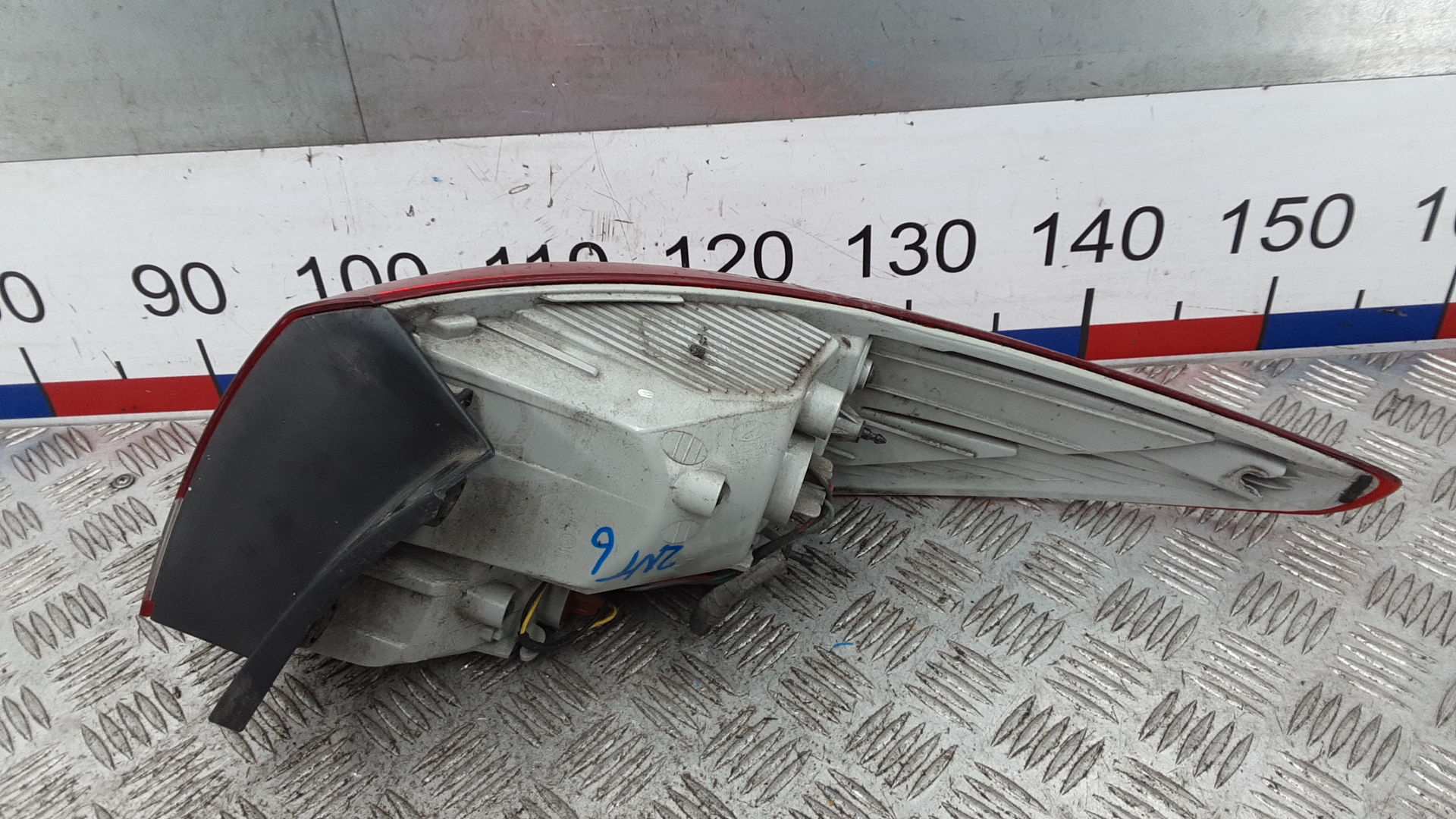 Фонарь задний левый