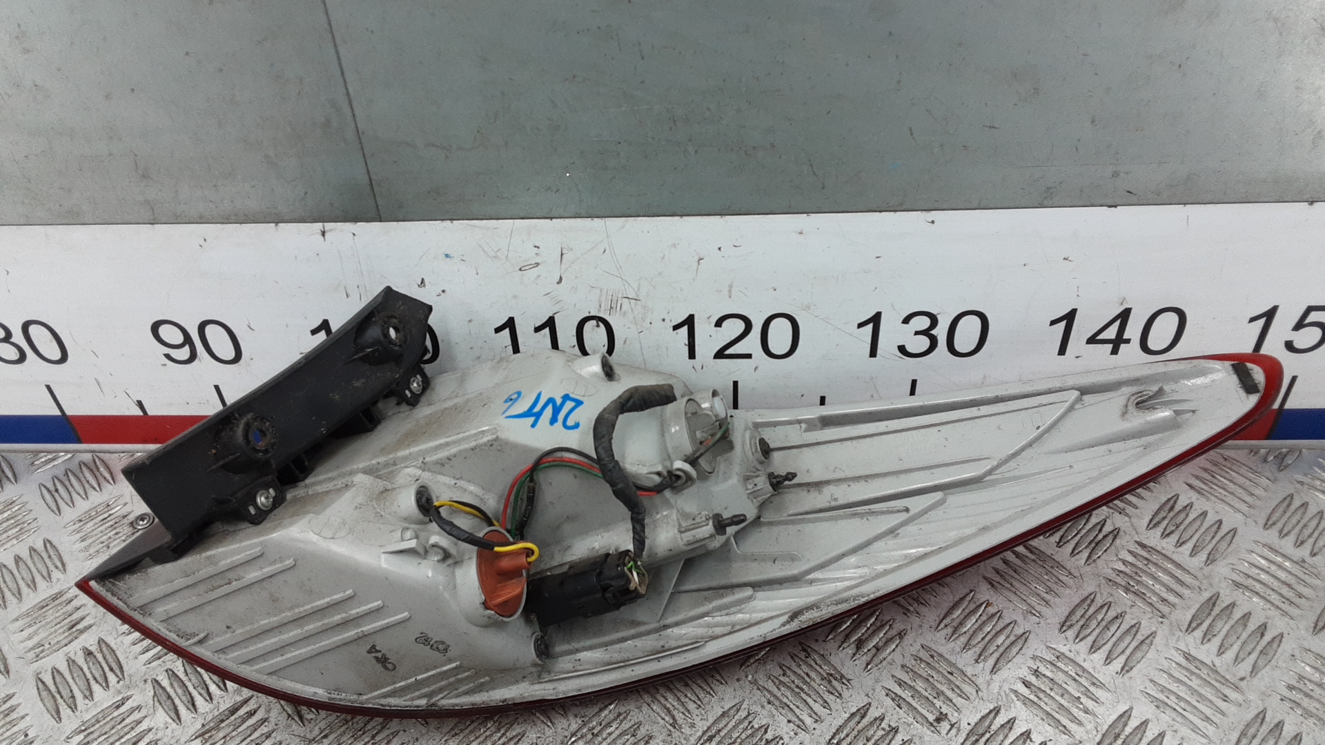 Фонарь задний левый