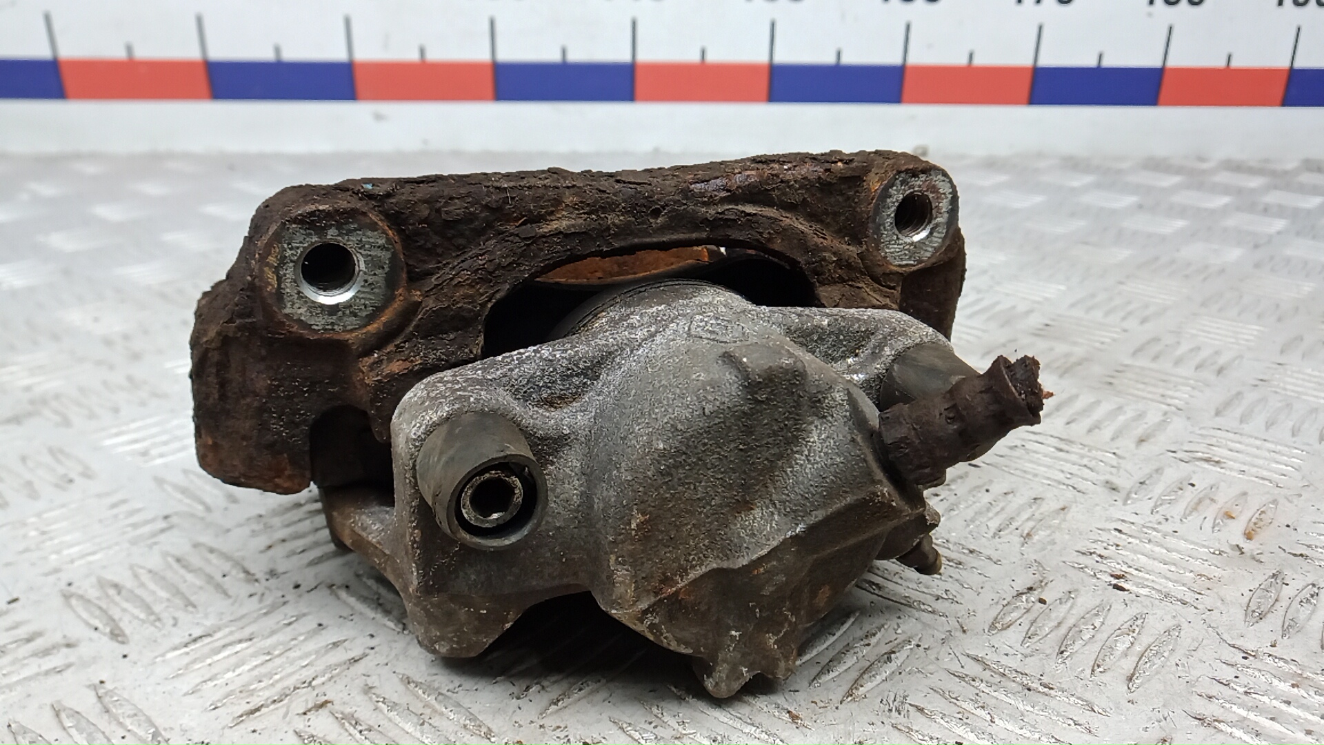 Суппорт передний левый