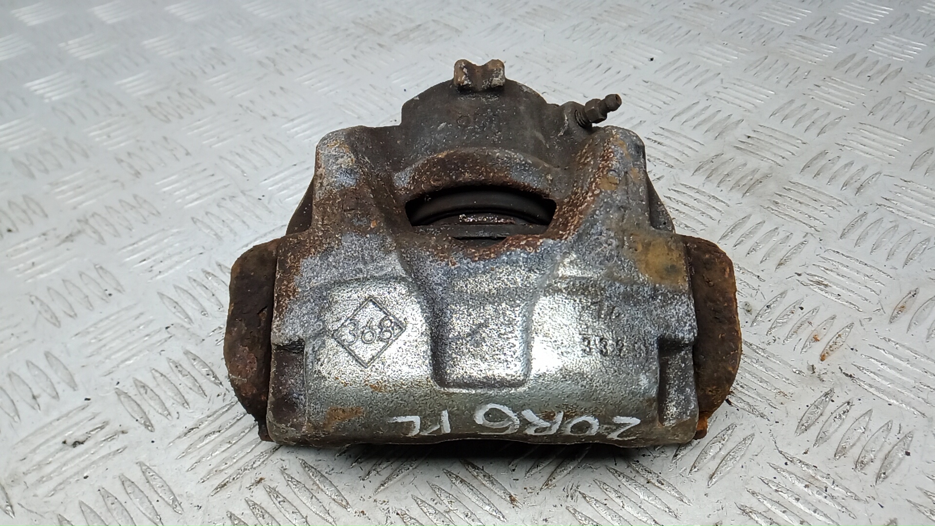 Суппорт передний левый