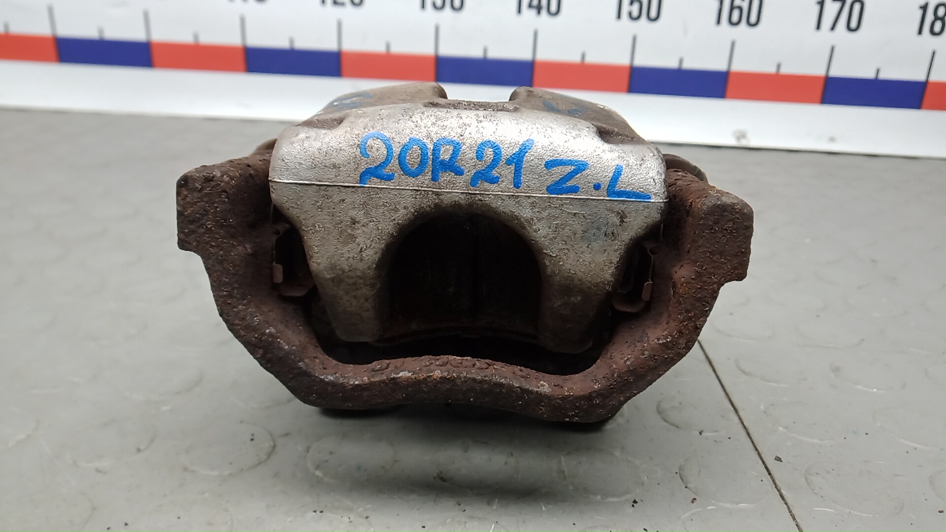 Суппорт задний левый