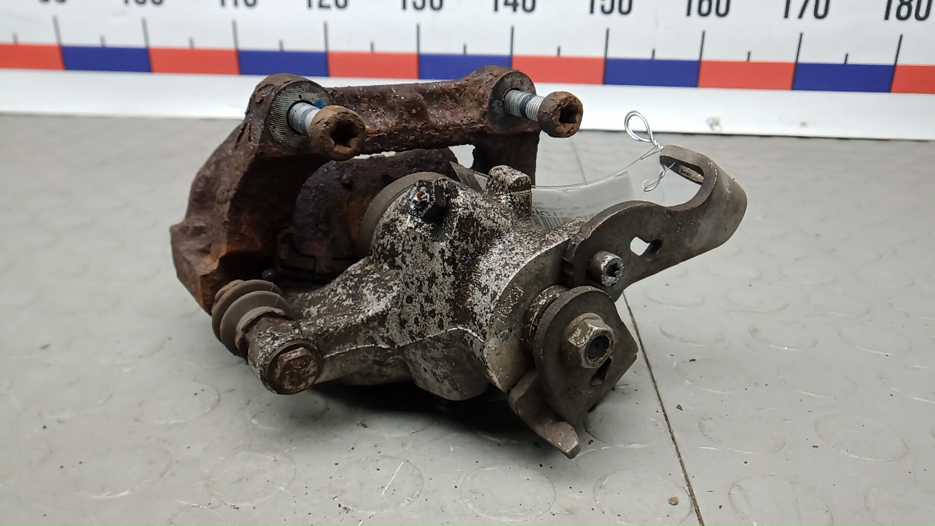 Суппорт задний левый