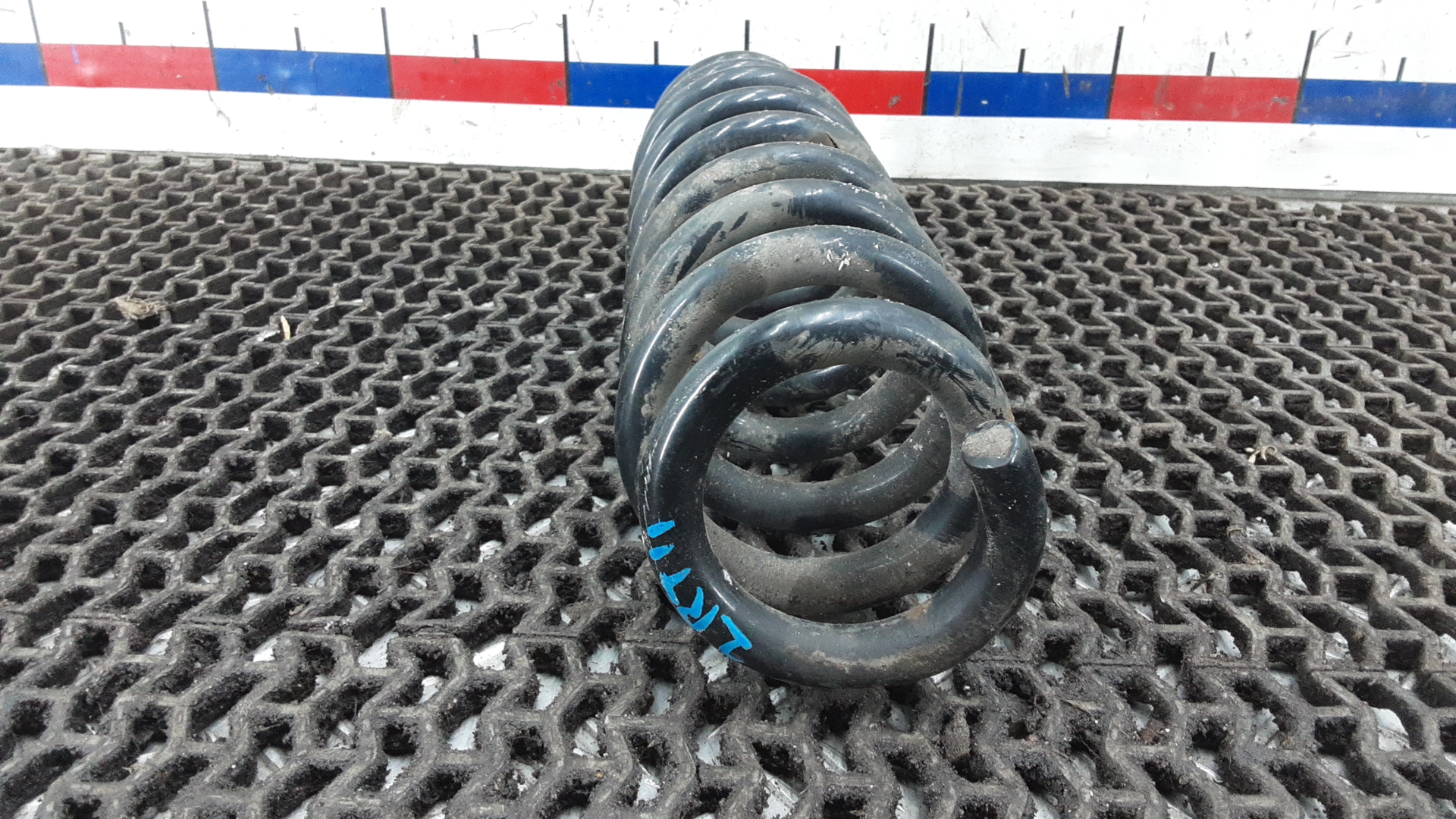 Пружина задняя