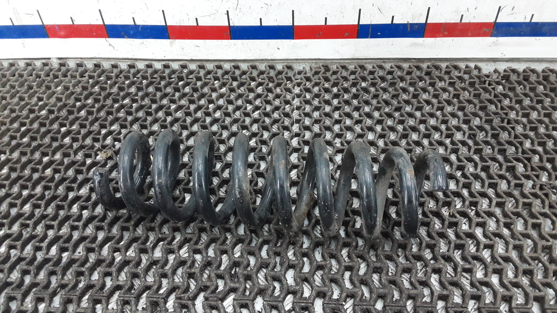 Пружина задняя