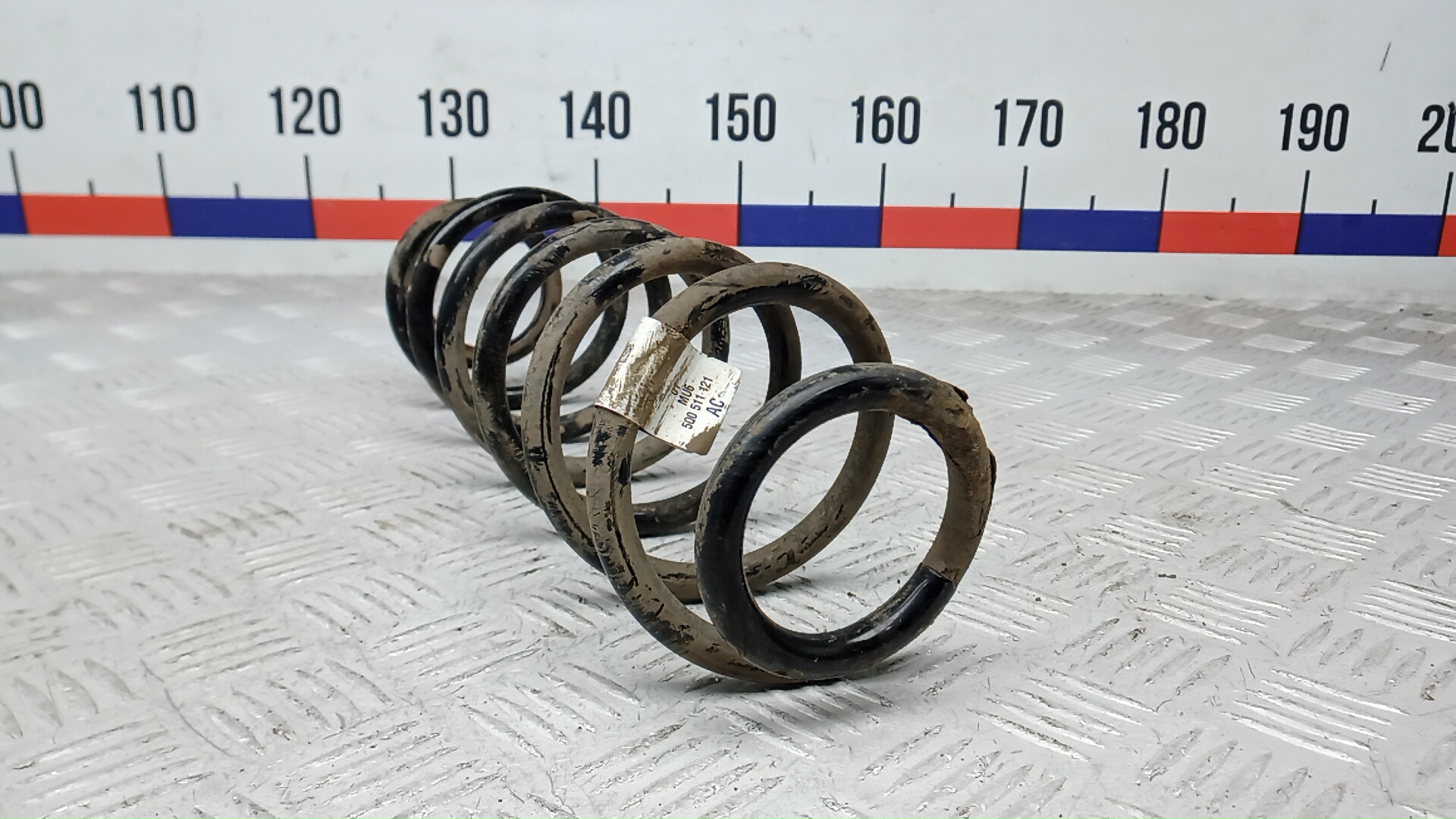 Пружина задняя