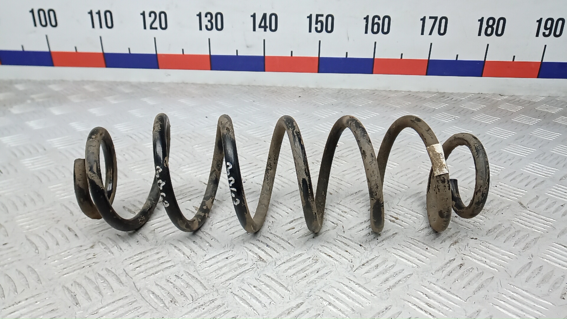 Пружина задняя