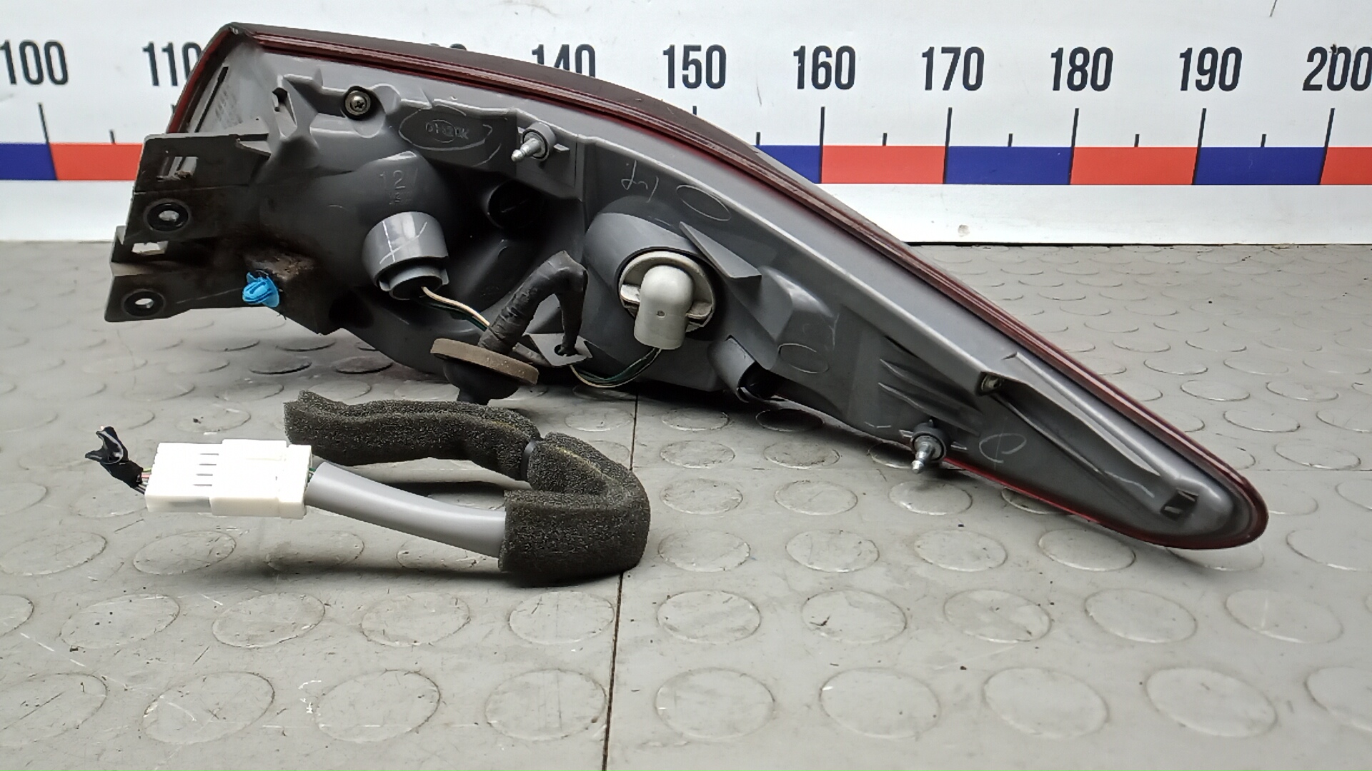 Фонарь задний левый