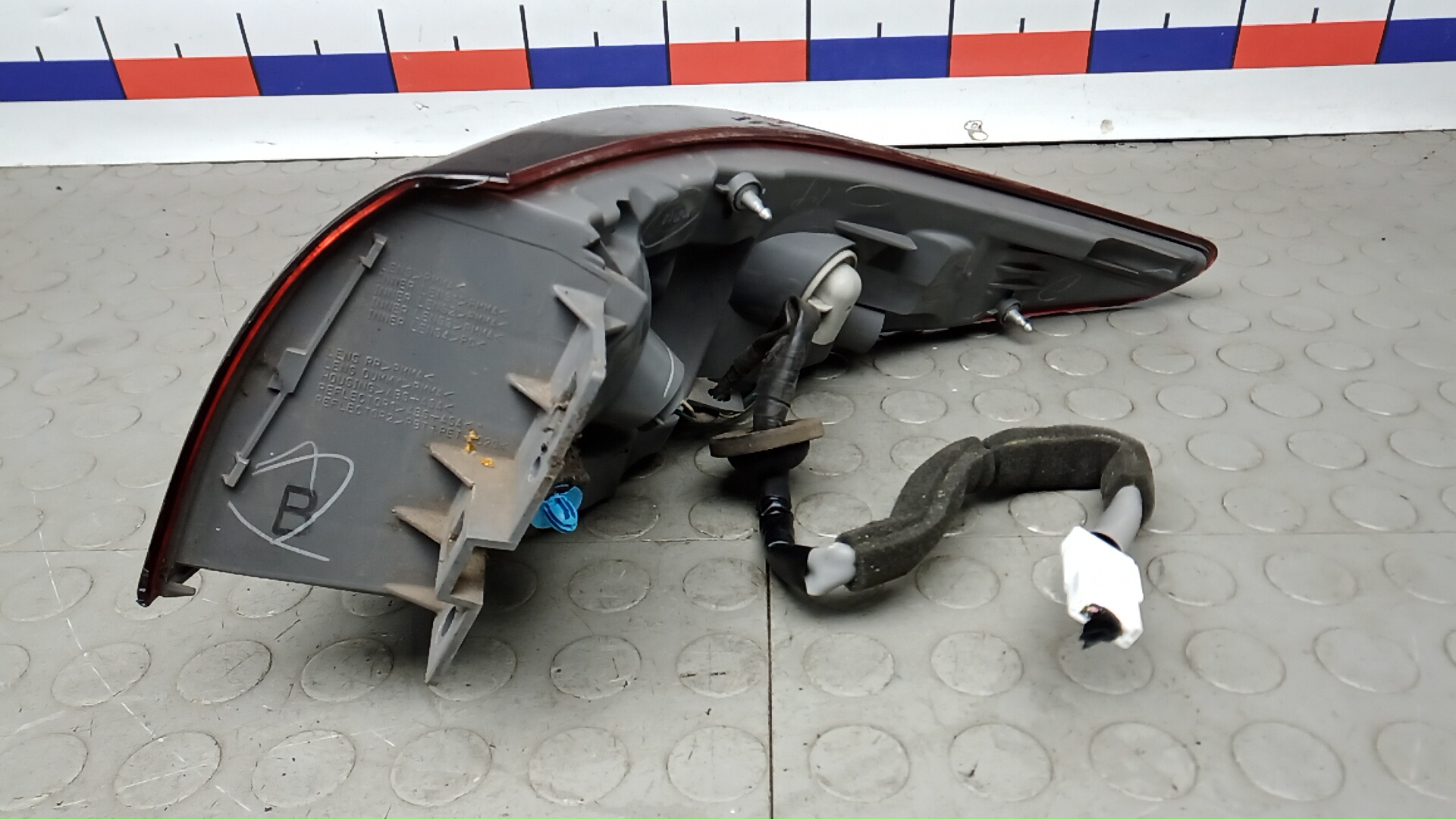 Фонарь задний левый