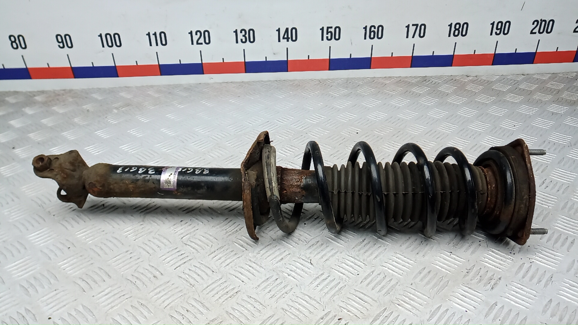 Амортизатор задний левый