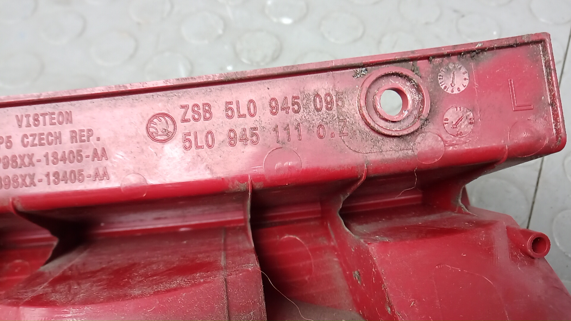 Фонарь задний левый