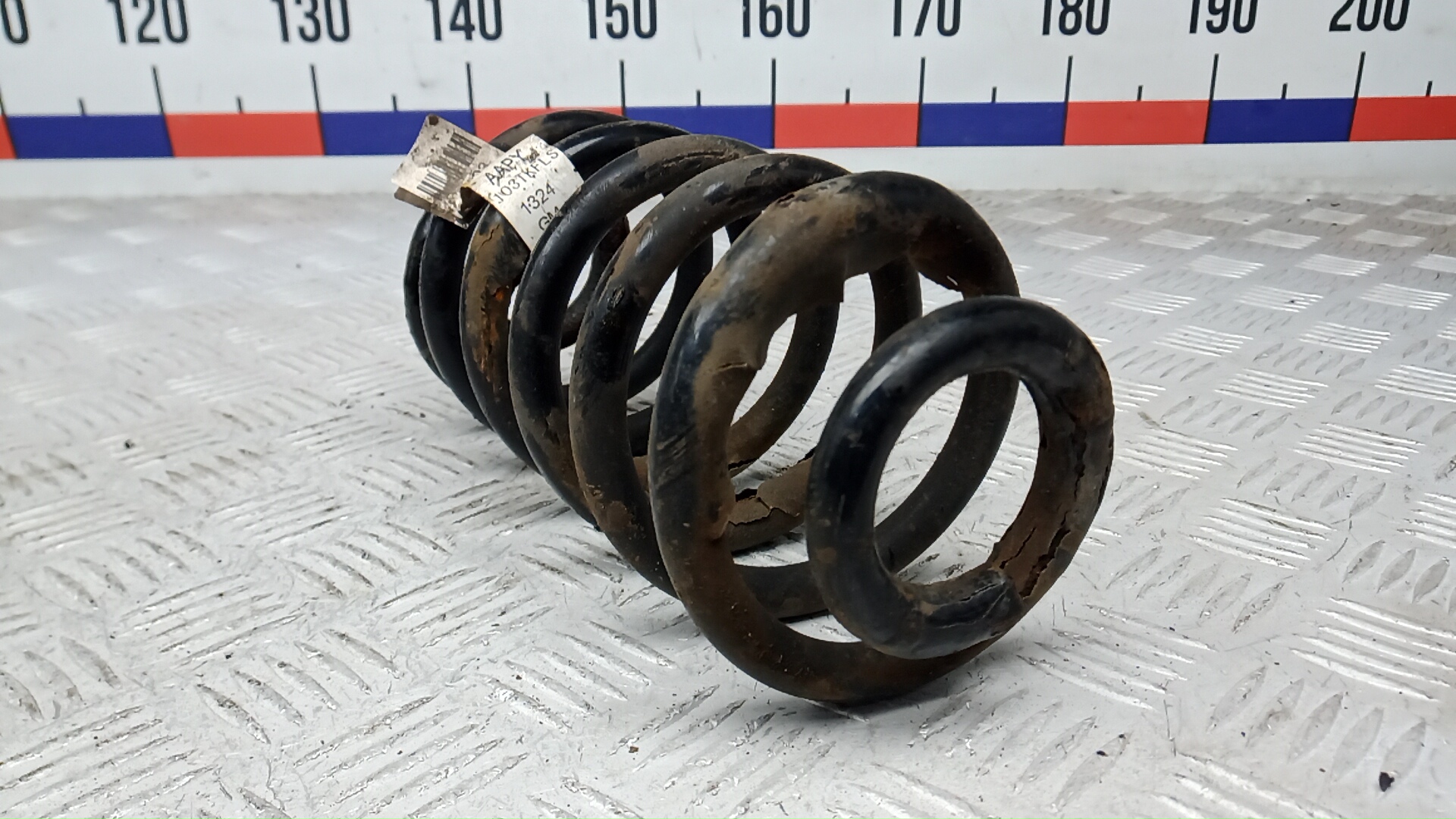 Пружина задняя