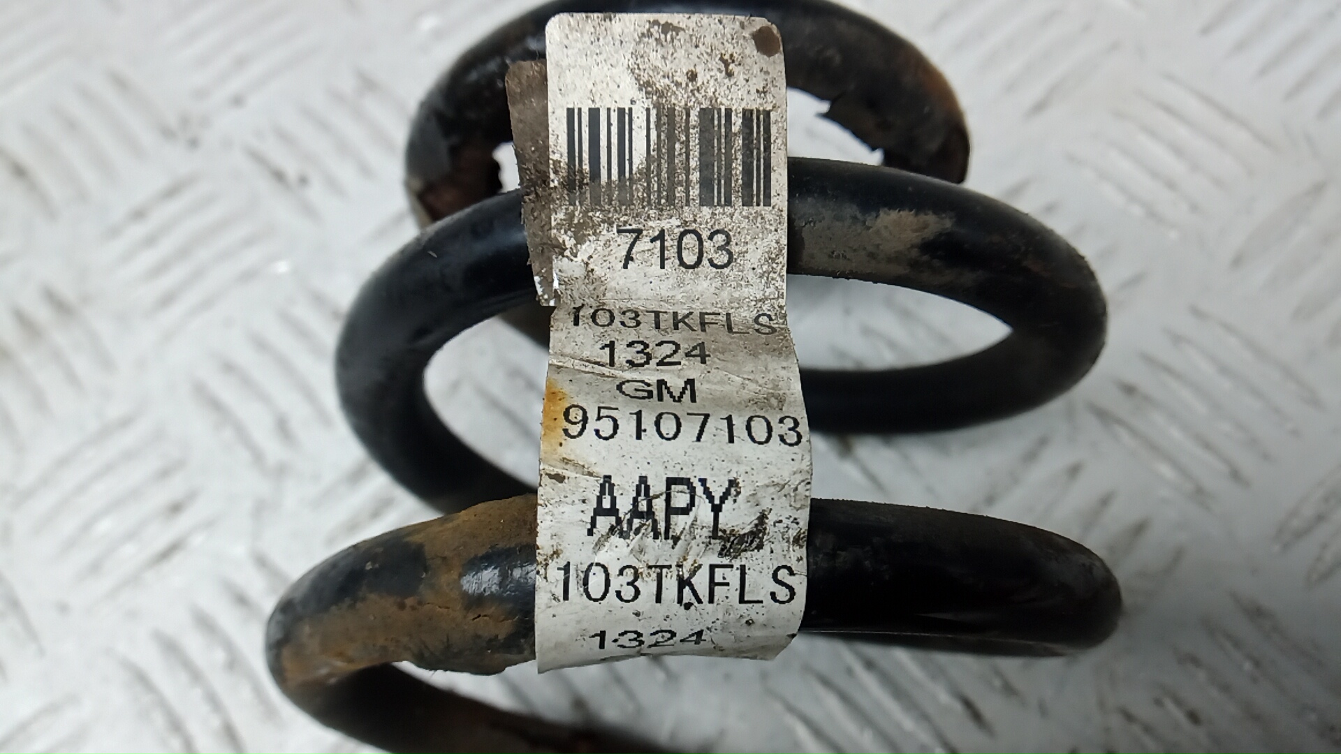 Пружина задняя