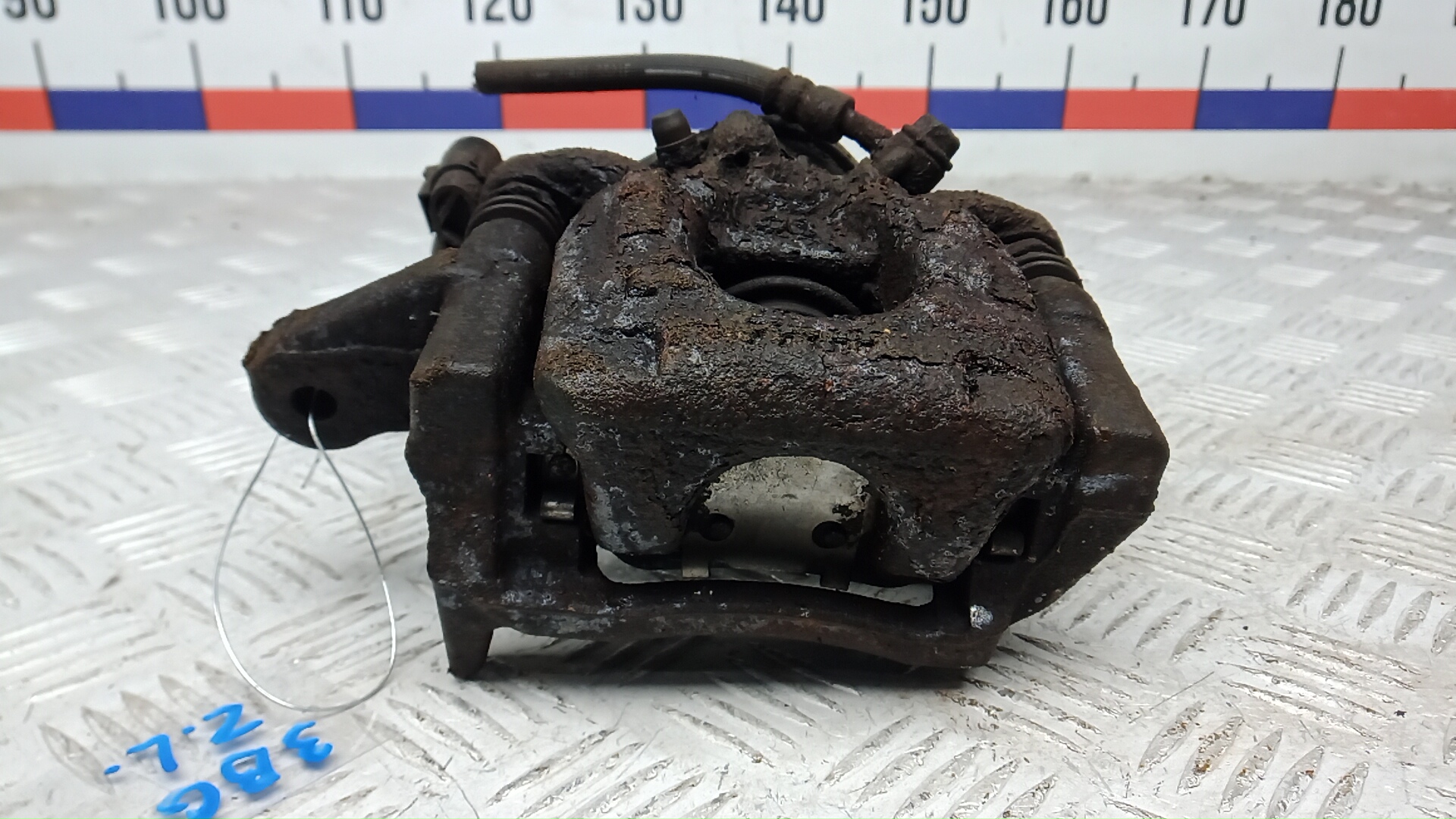 Суппорт задний левый