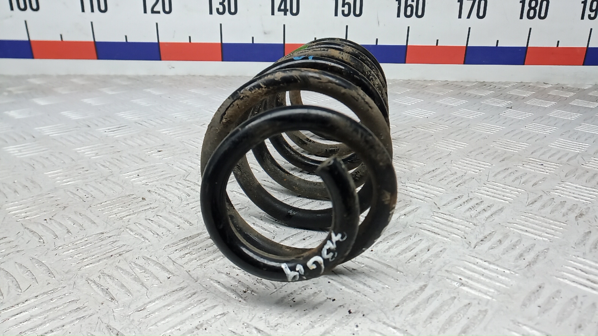 Пружина задняя