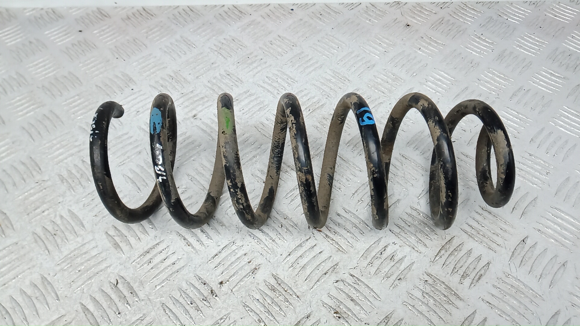 Пружина задняя