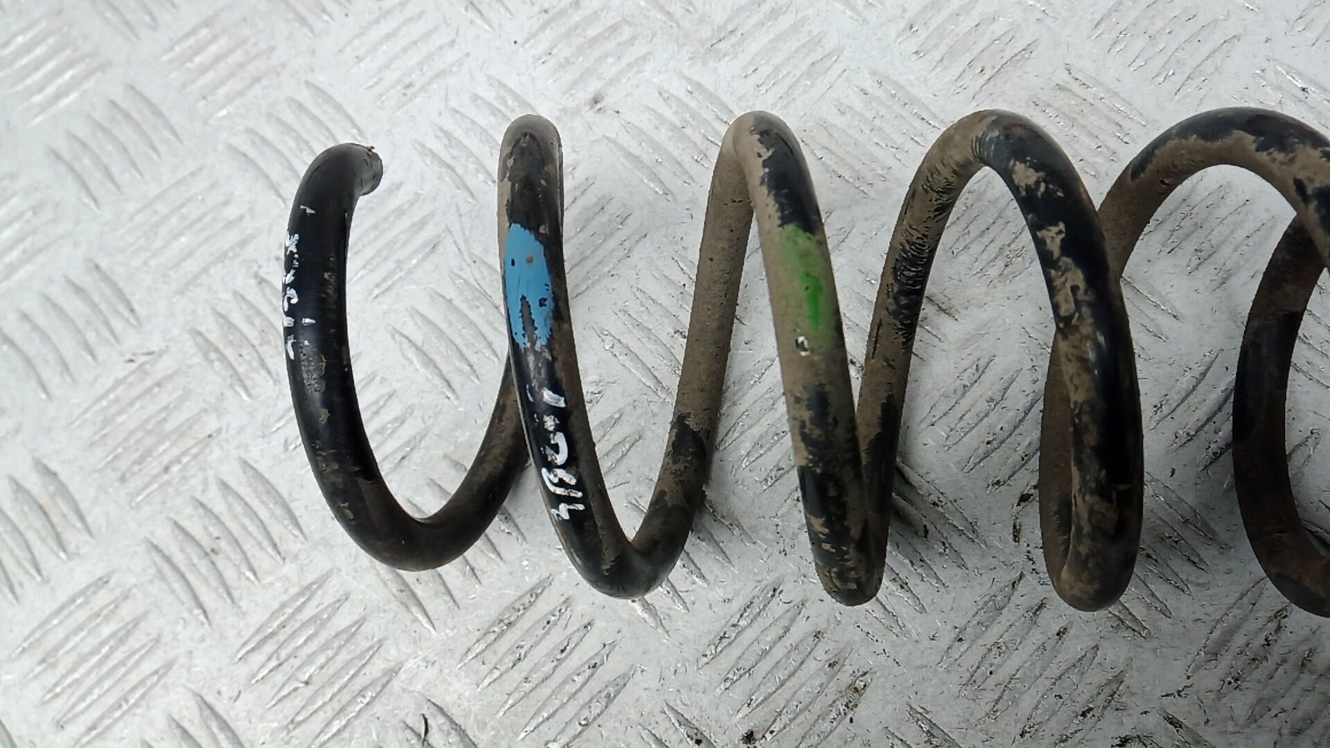 Пружина задняя