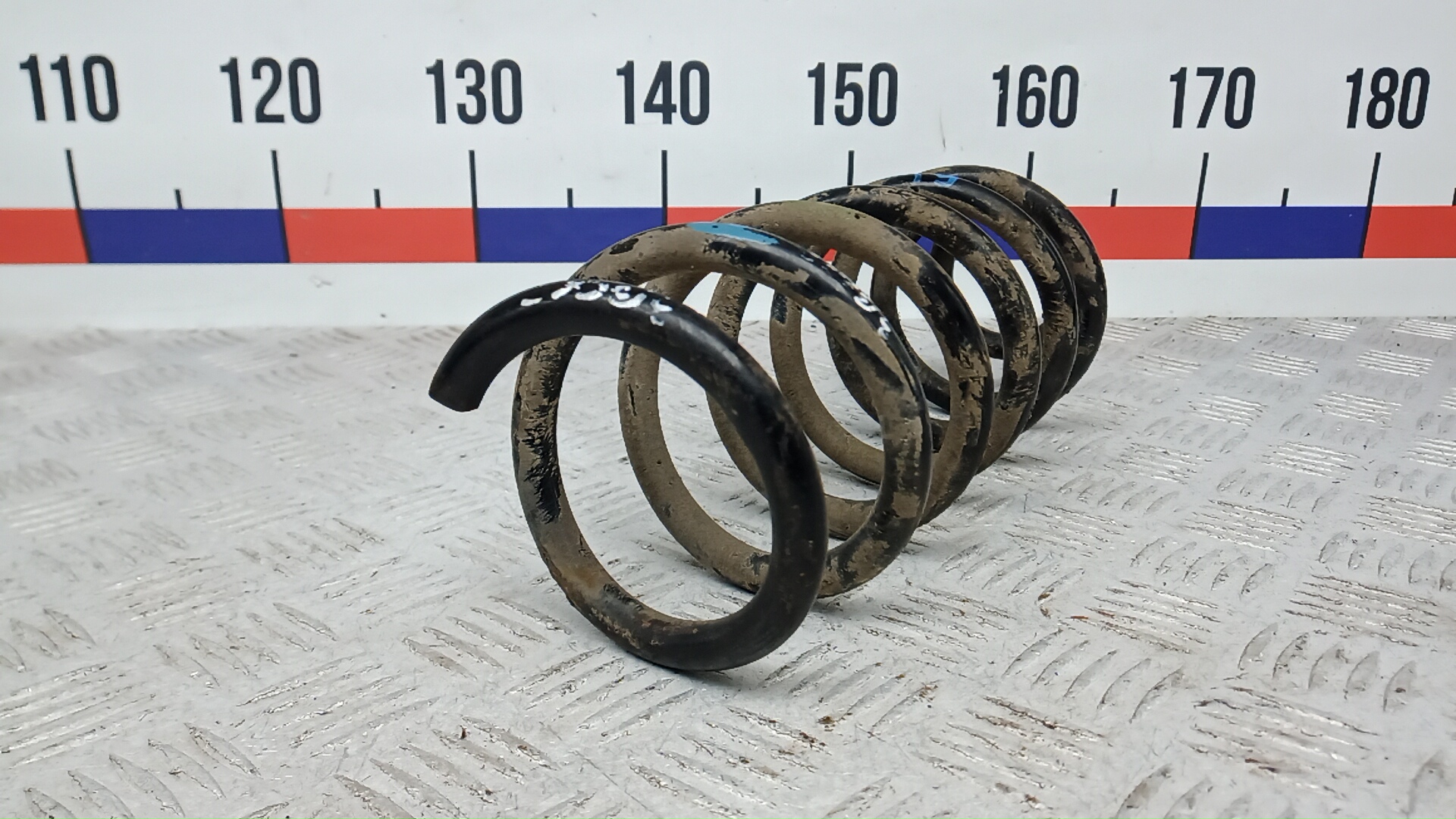 Пружина задняя