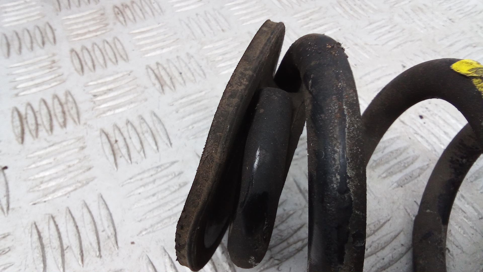 Пружина задняя