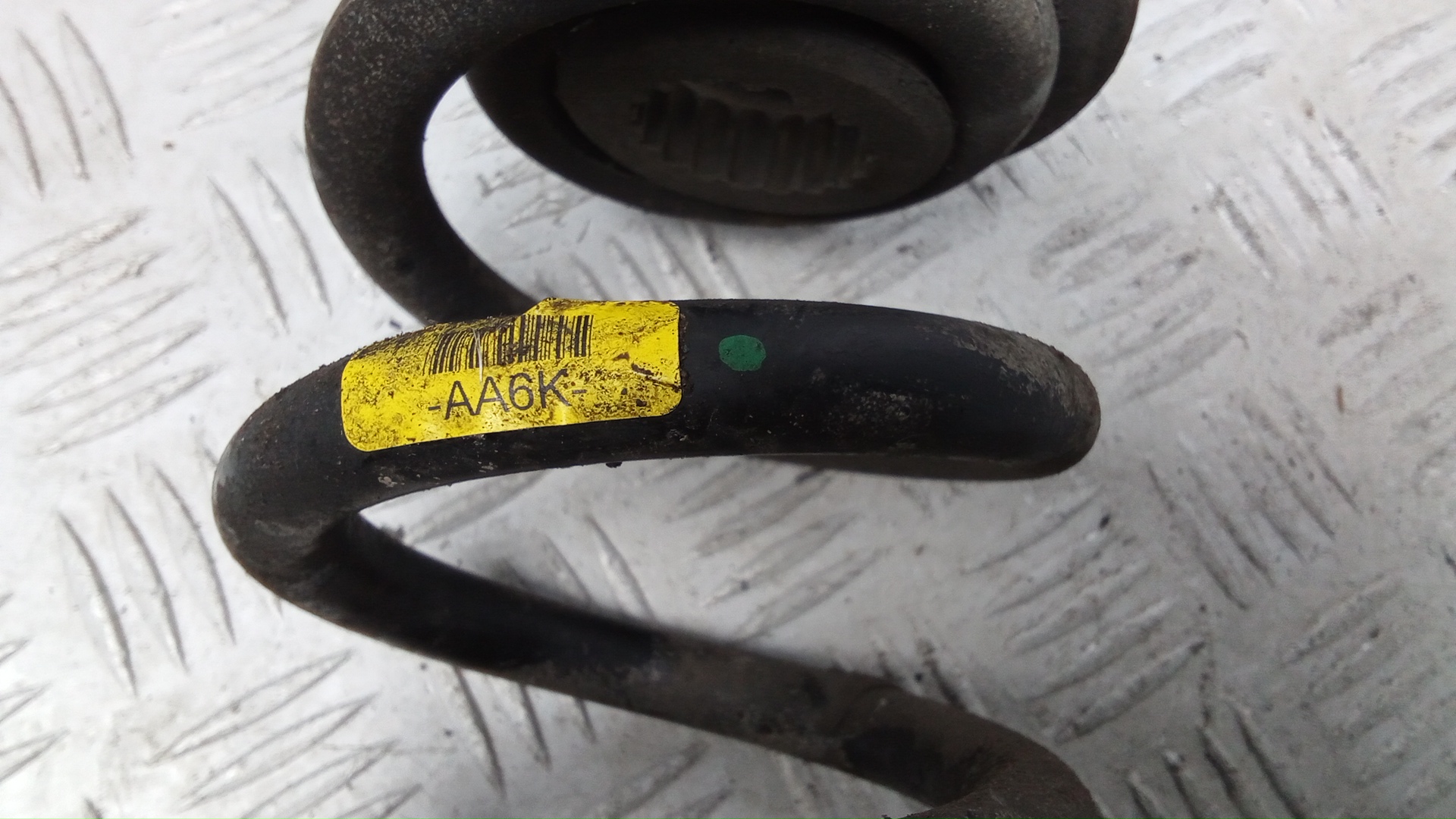 Пружина задняя