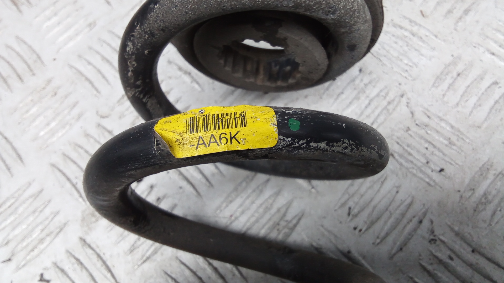 Пружина задняя