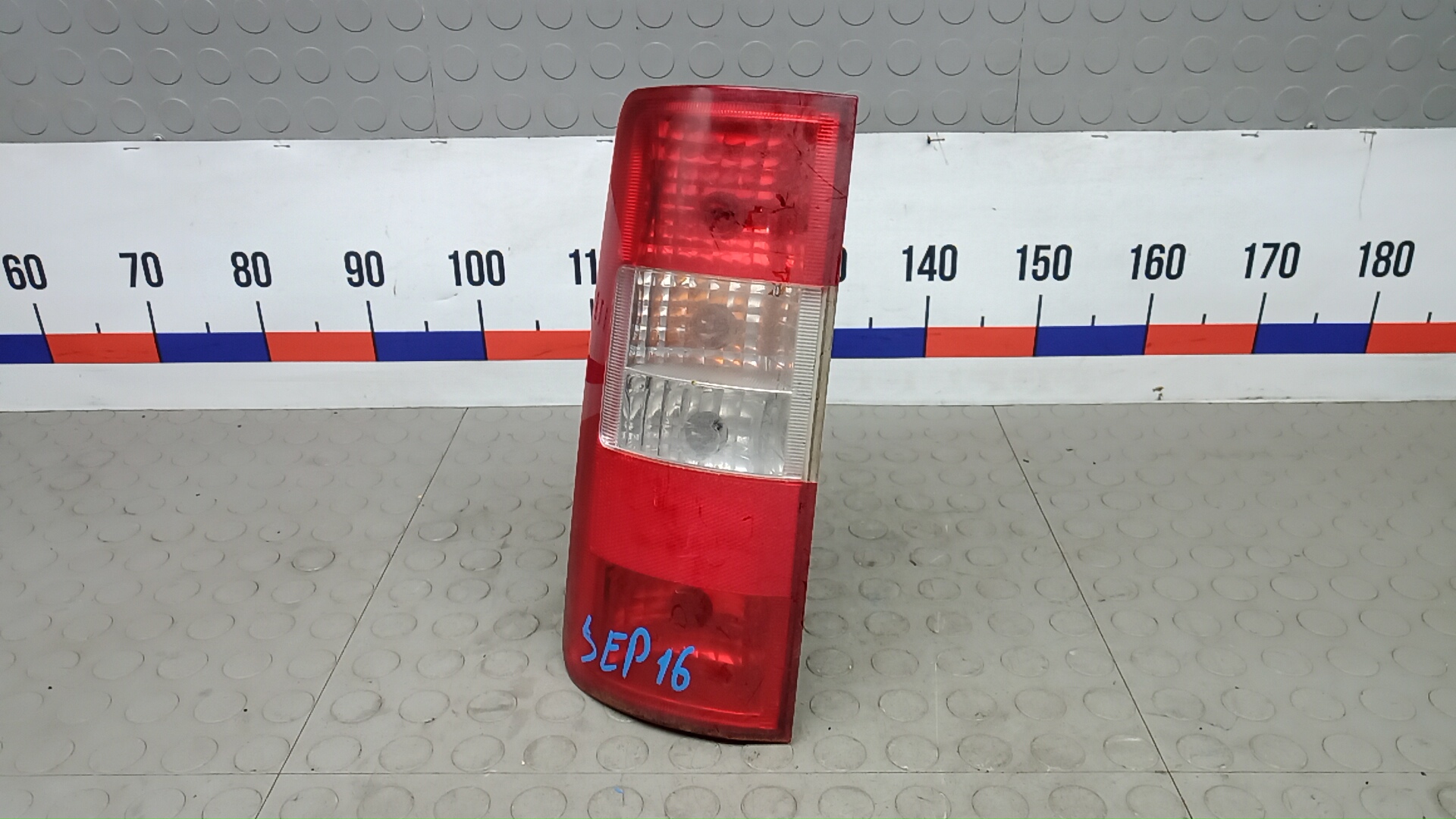 Фонарь задний левый