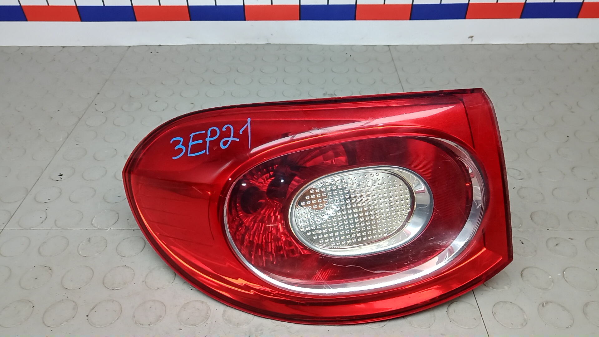Фонарь задний левый