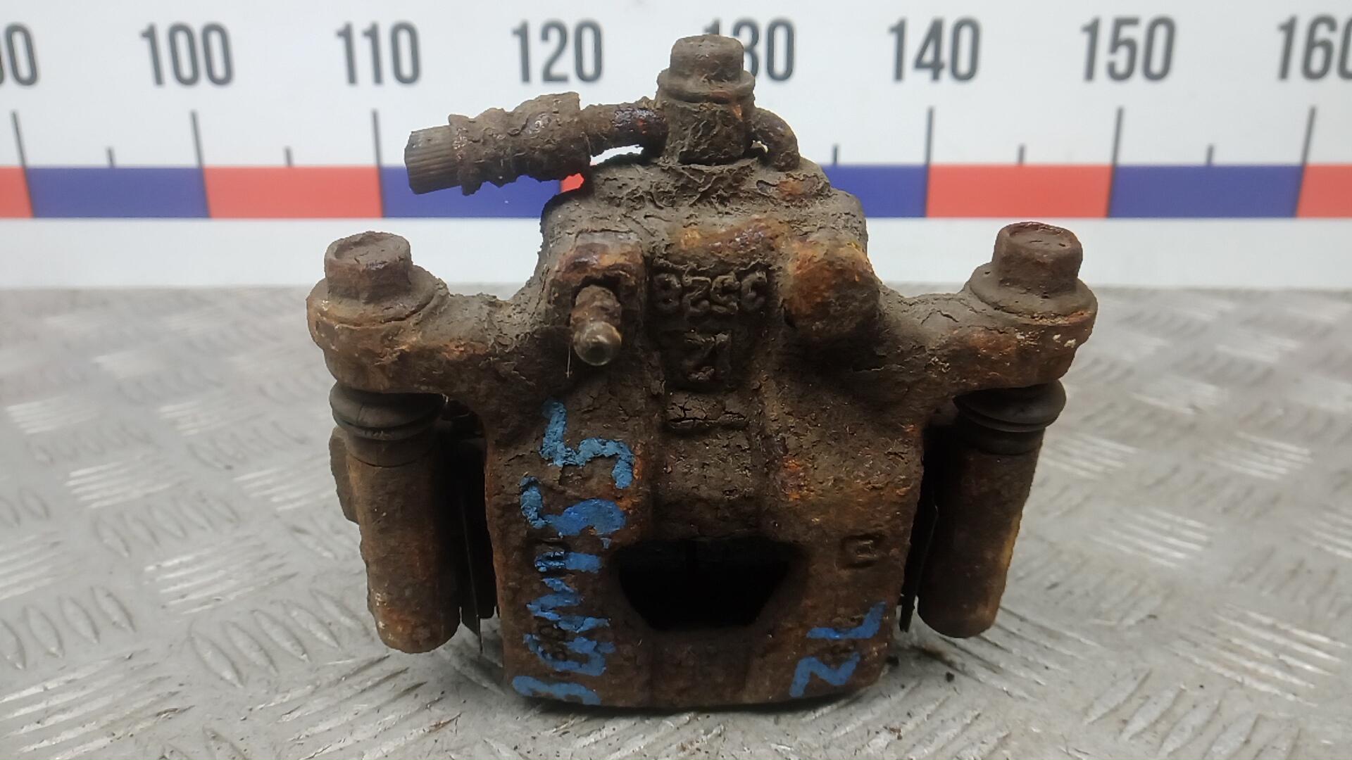 Суппорт задний левый