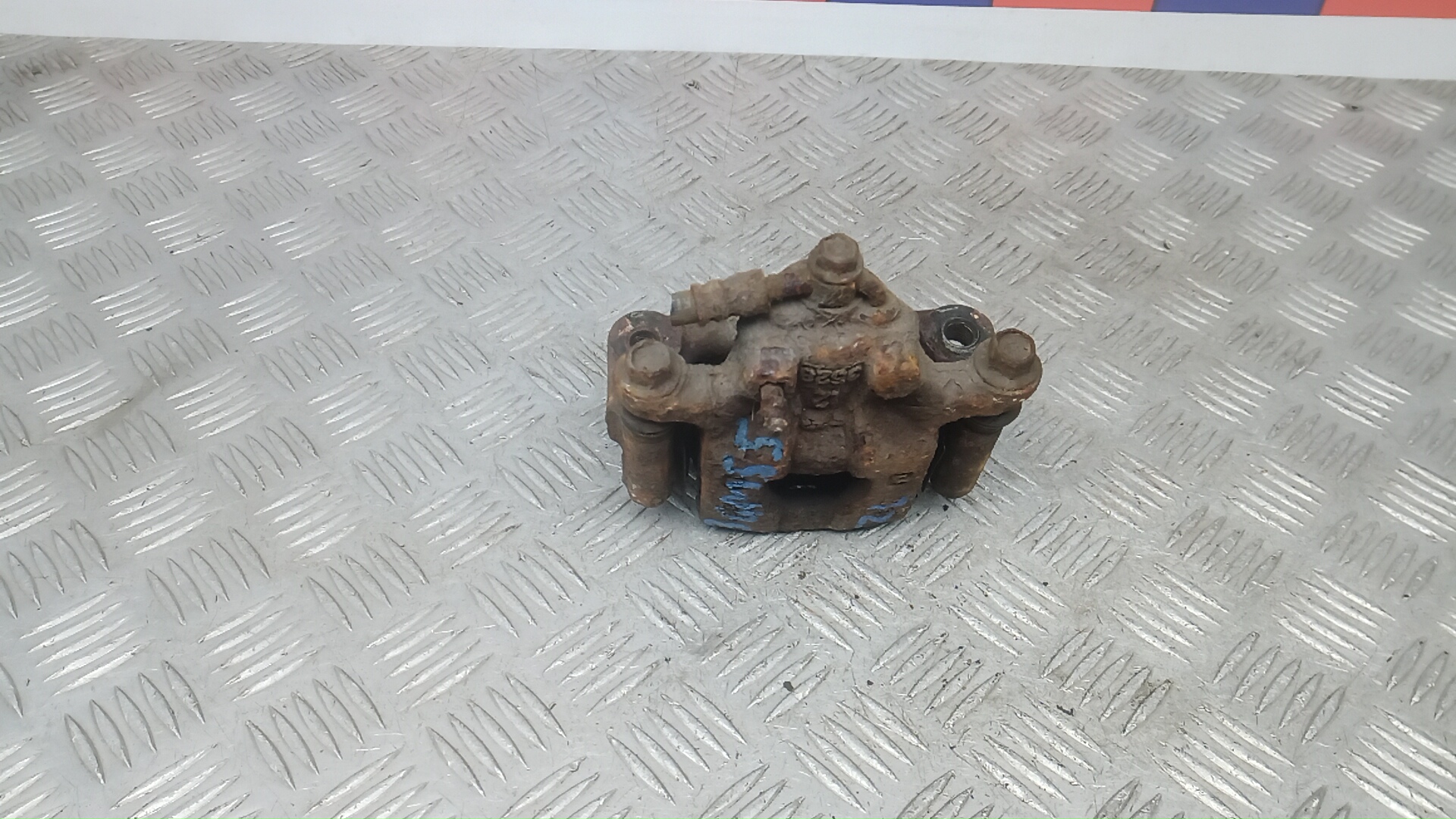 Суппорт задний левый