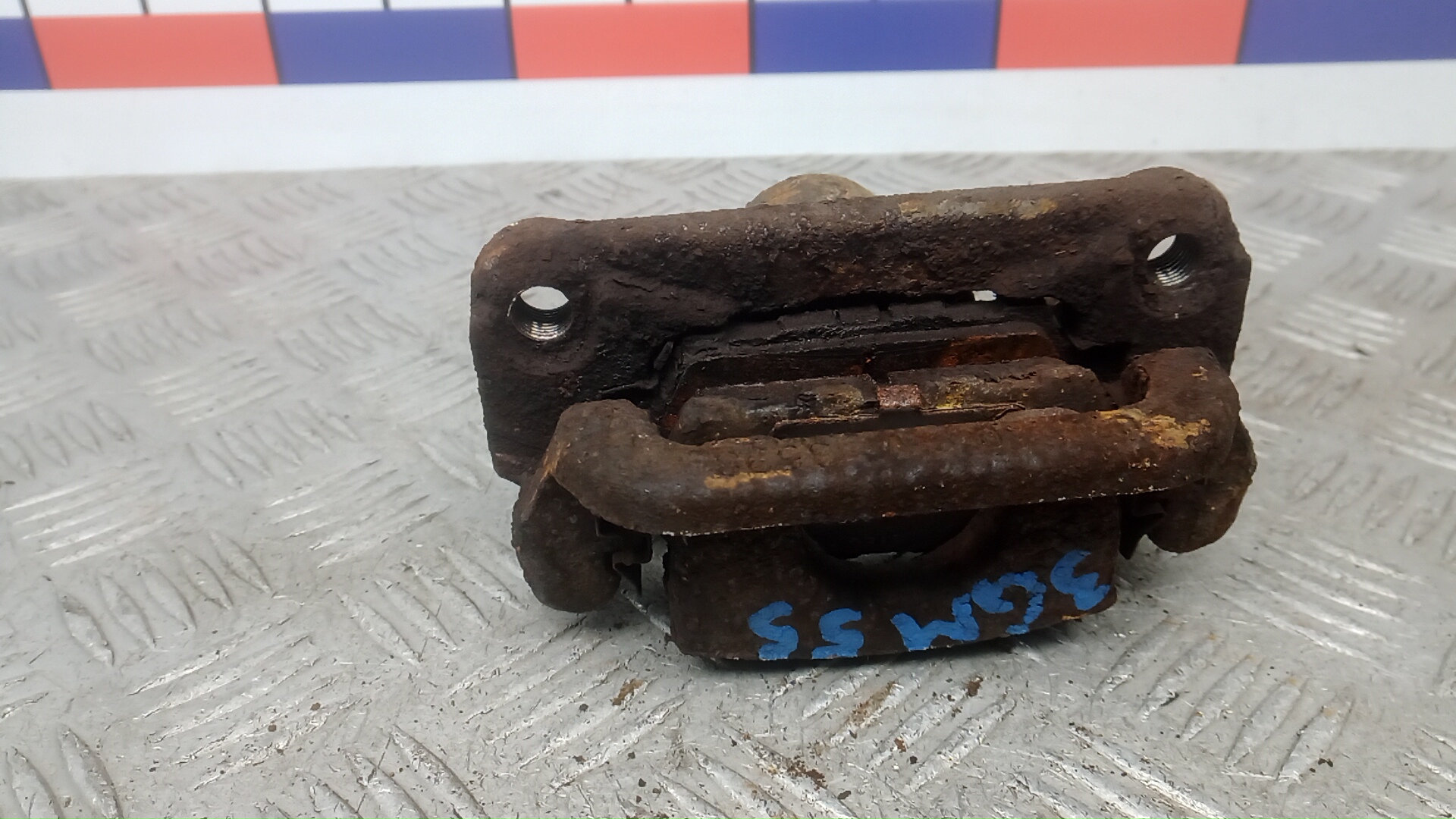 Суппорт задний левый