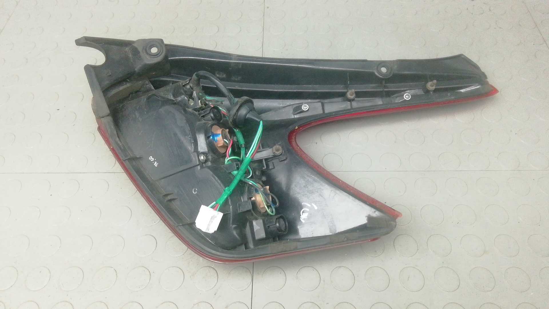 Фонарь задний левый