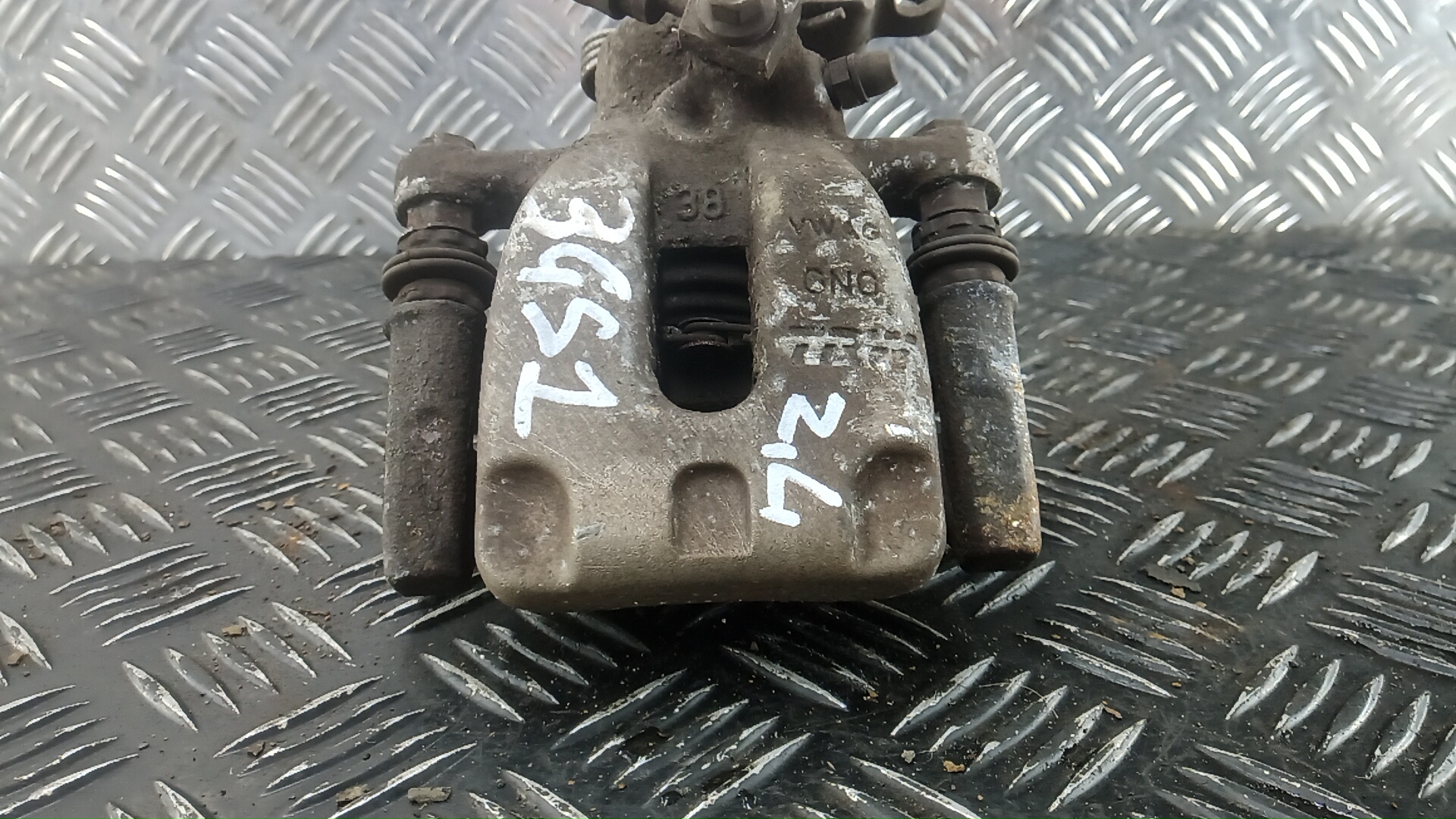 Суппорт задний левый