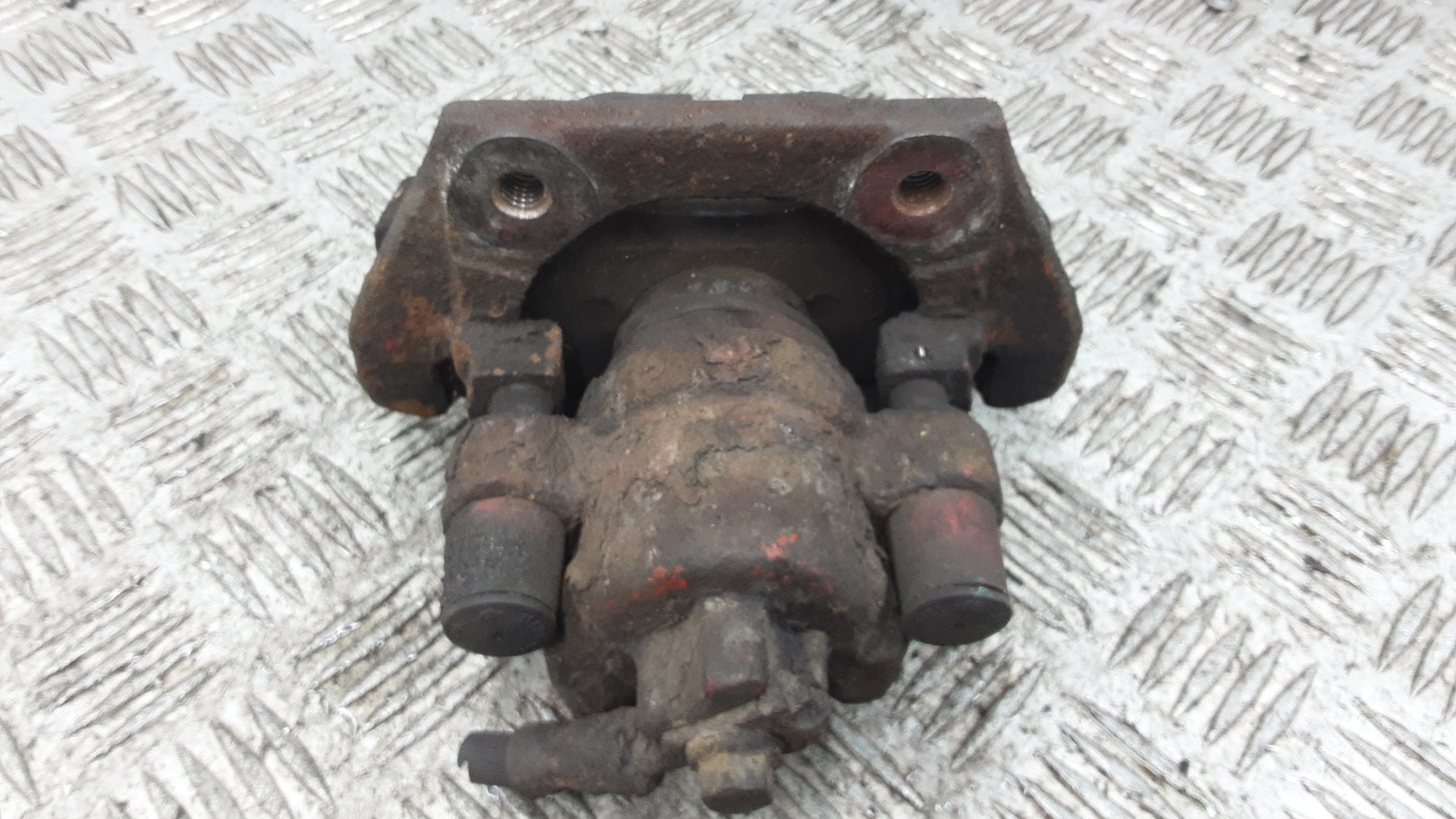 Суппорт задний левый