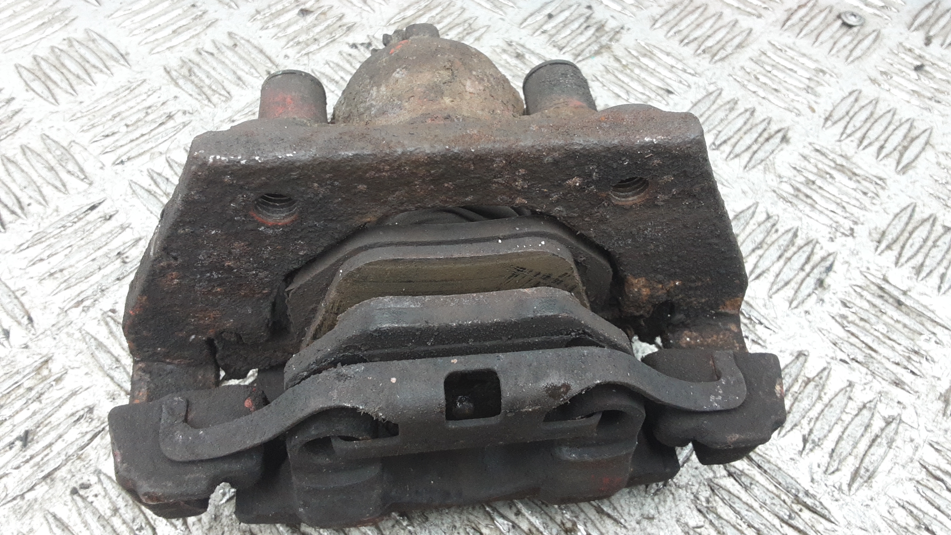 Суппорт задний левый