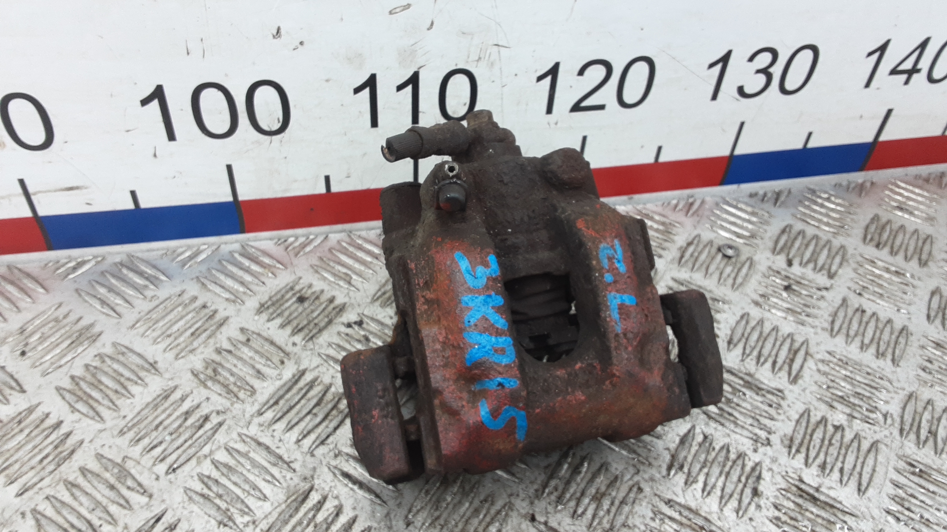 Суппорт задний левый