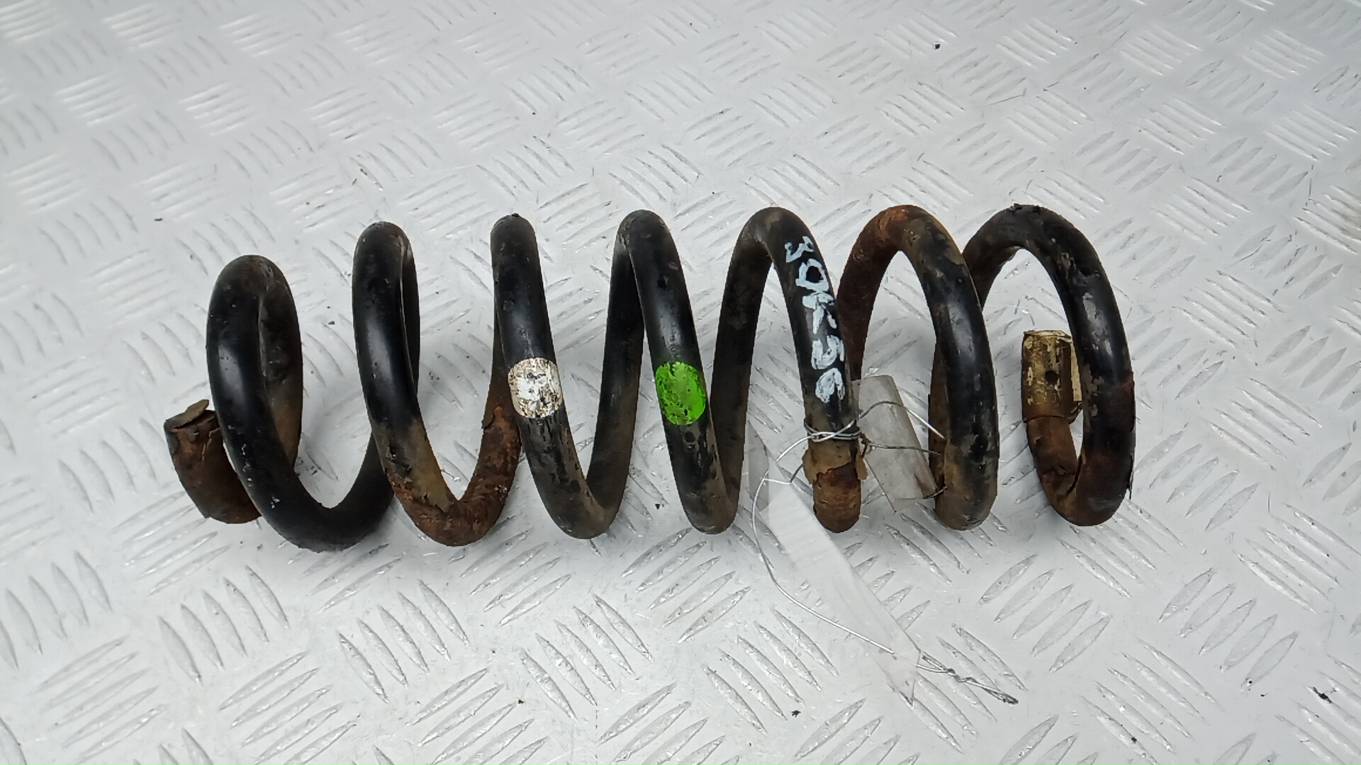 Пружина задняя