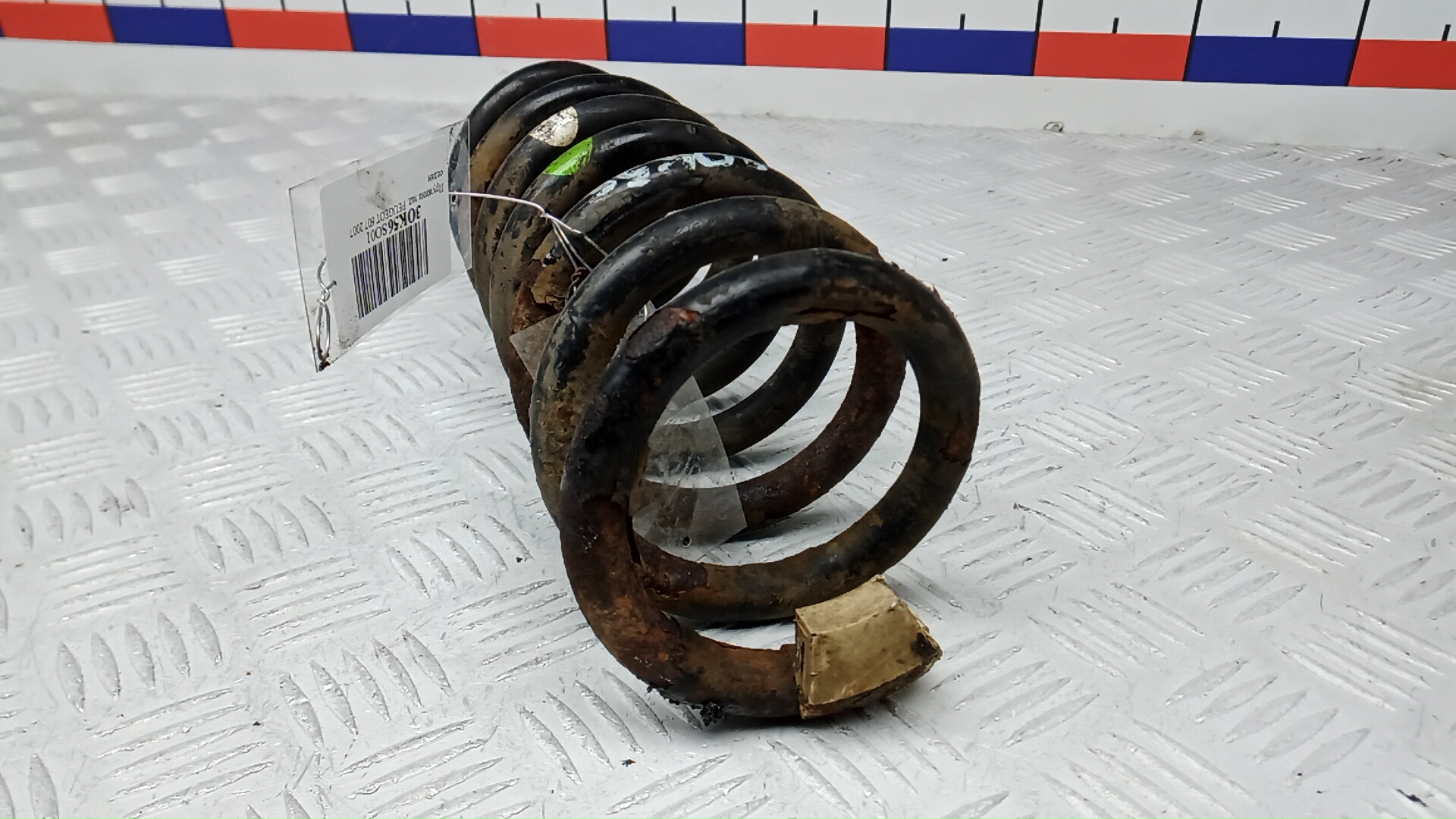 Пружина задняя