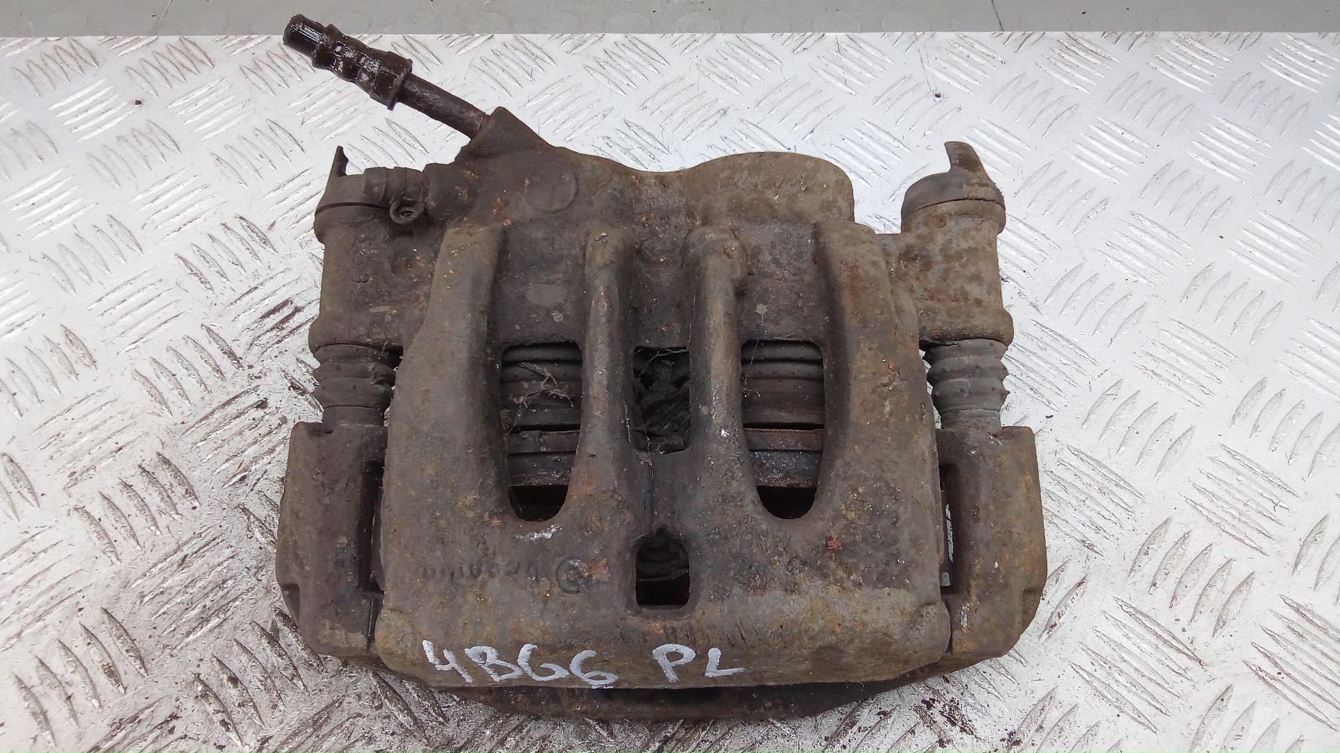 Суппорт передний левый