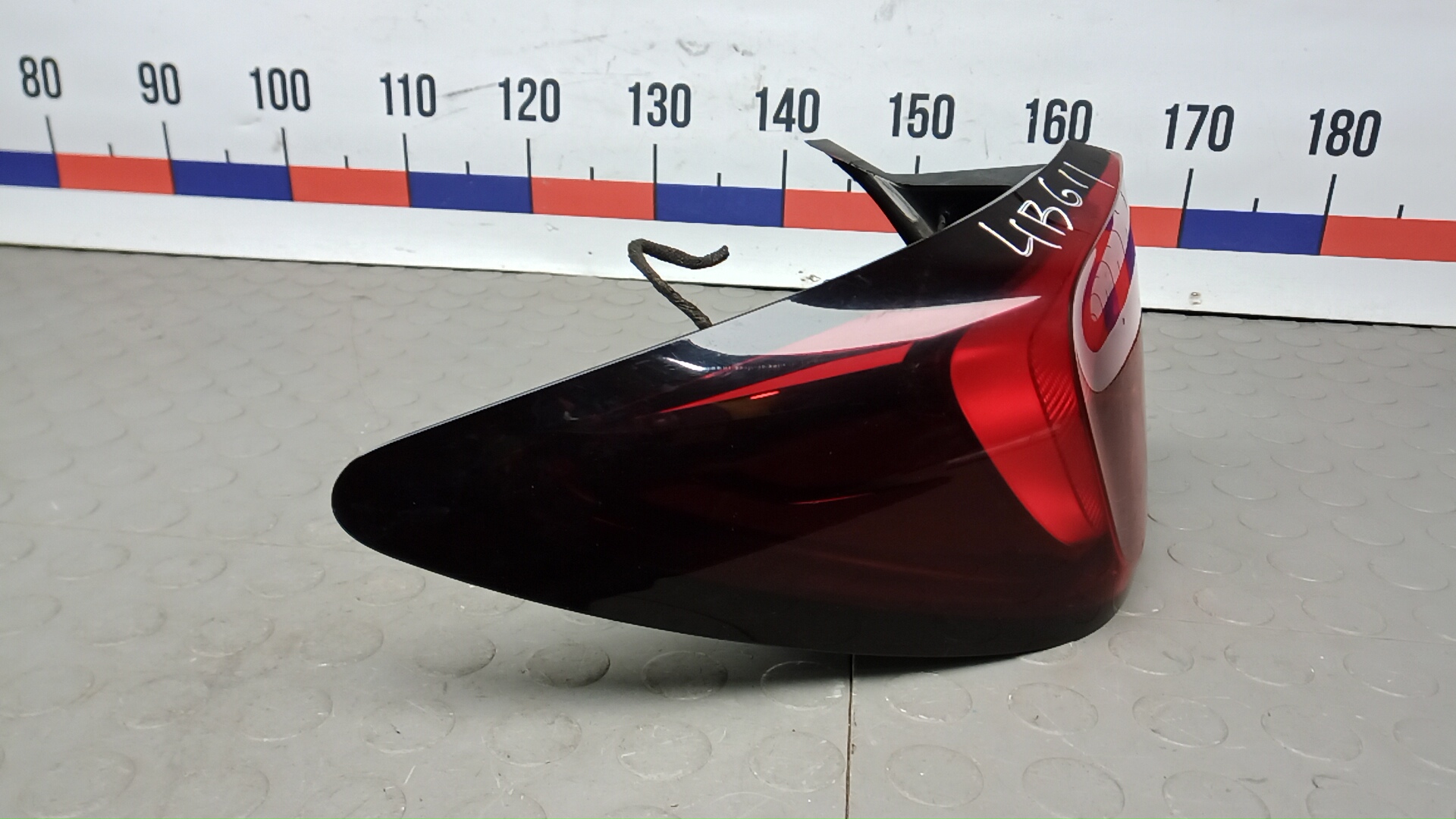 Фонарь задний левый