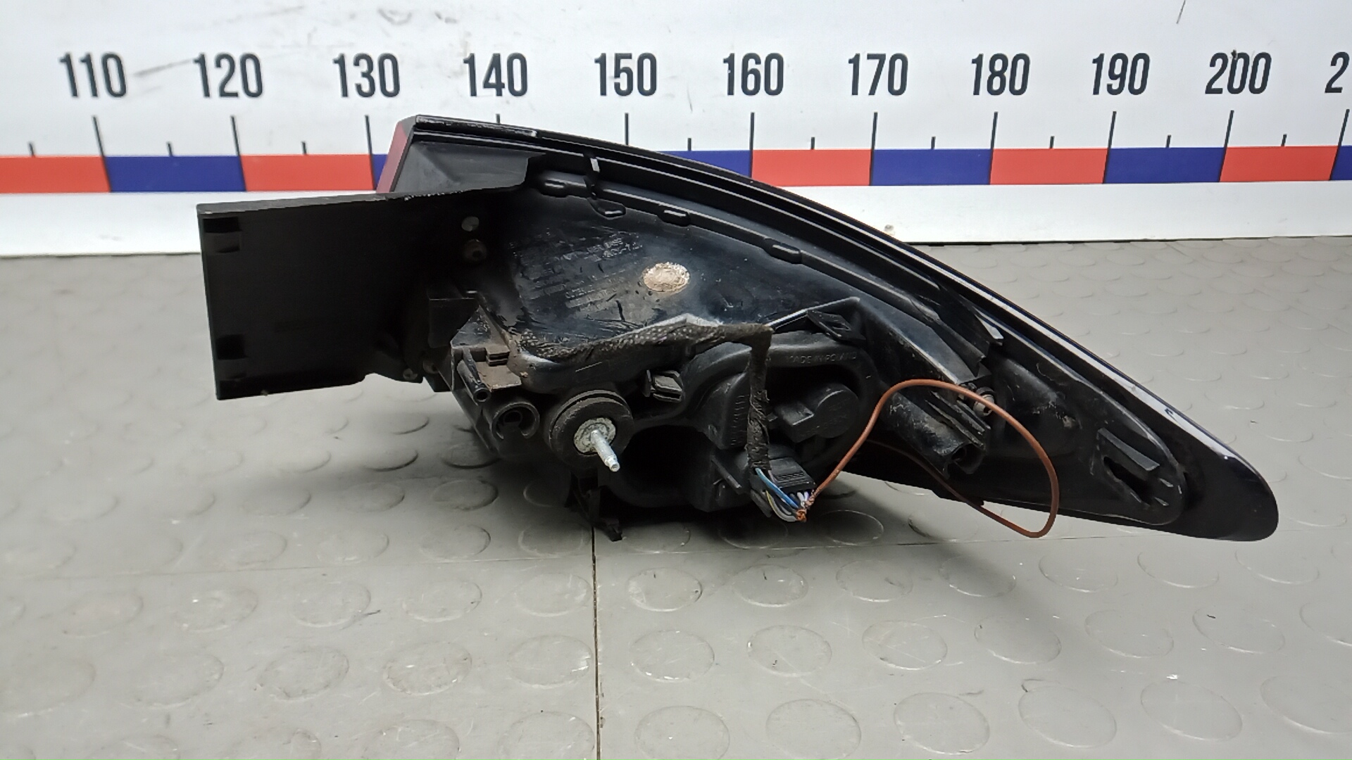 Фонарь задний левый